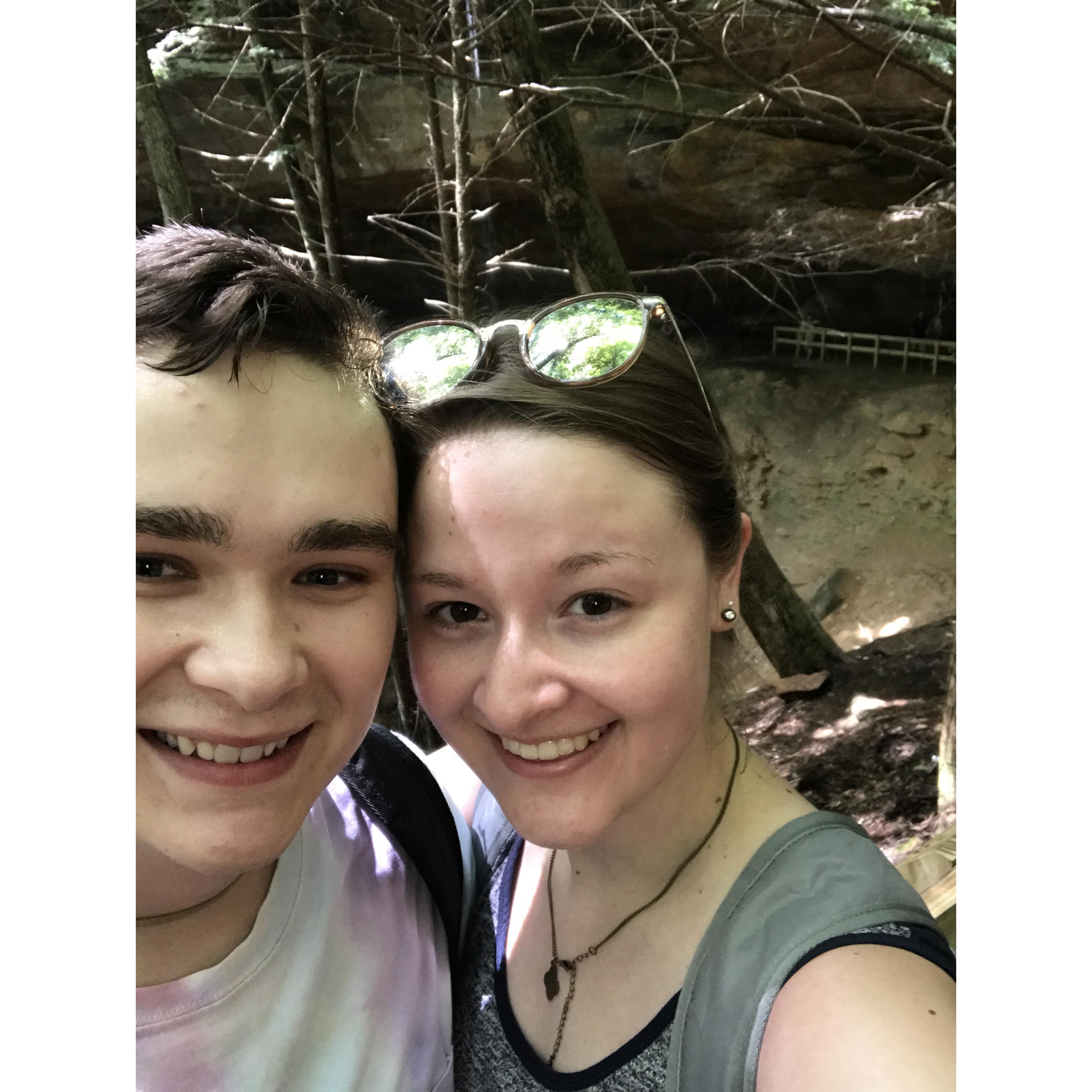 During a hike at Hocking Hills. This was meant to be a quick snapshot to remember the day, but ended up being more significant than expected because we got engaged later that day!