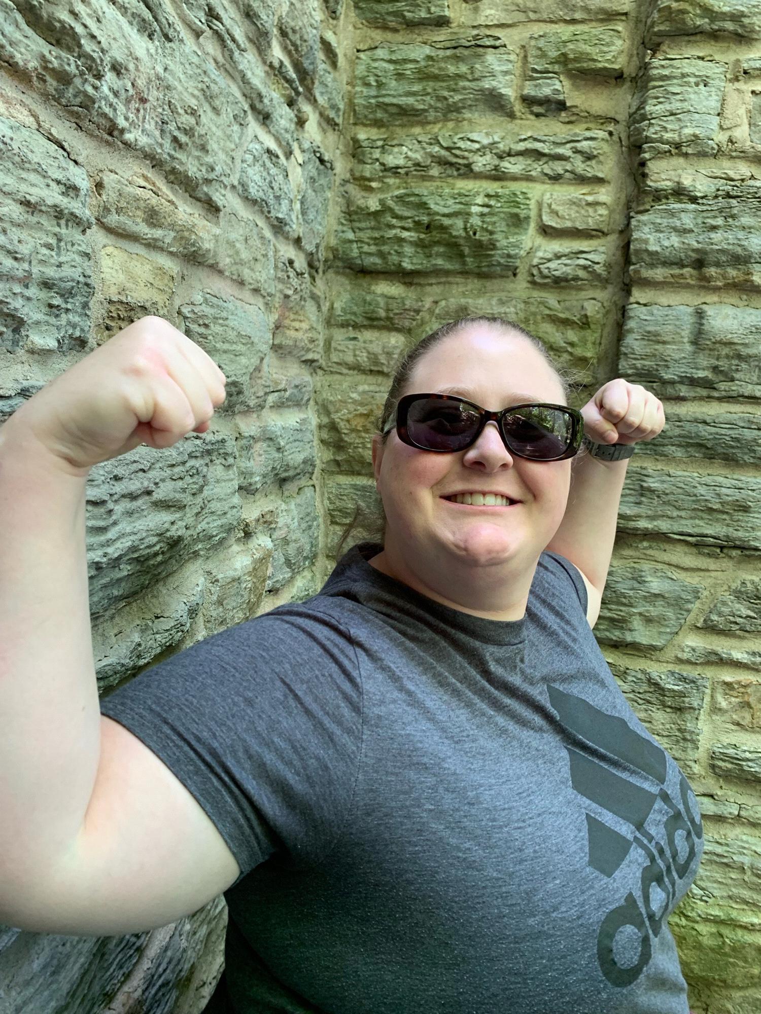 Allie showing her guns on one of our many hikes , , ,