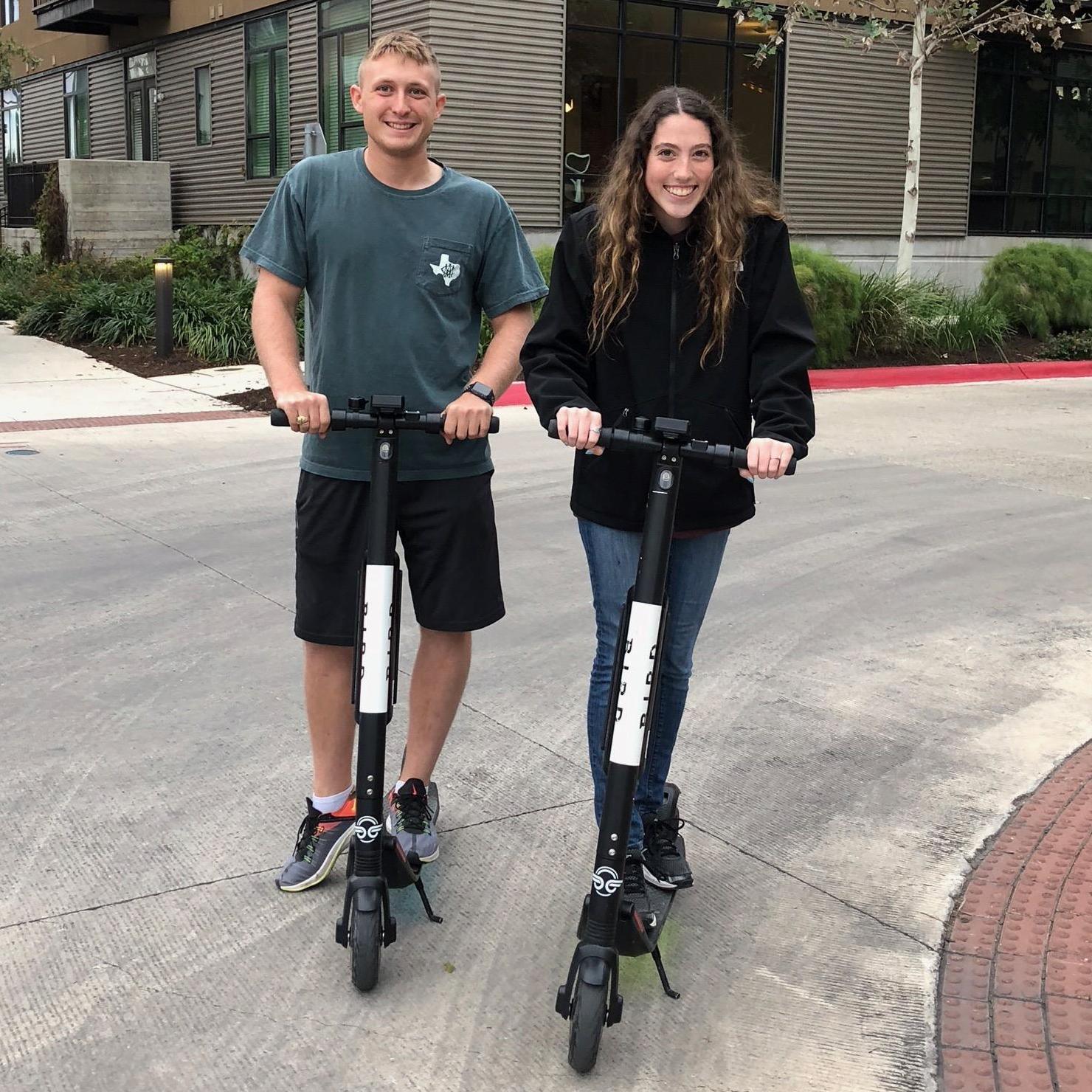 Riding scooters in downtown San Antonio, Nov. 2018