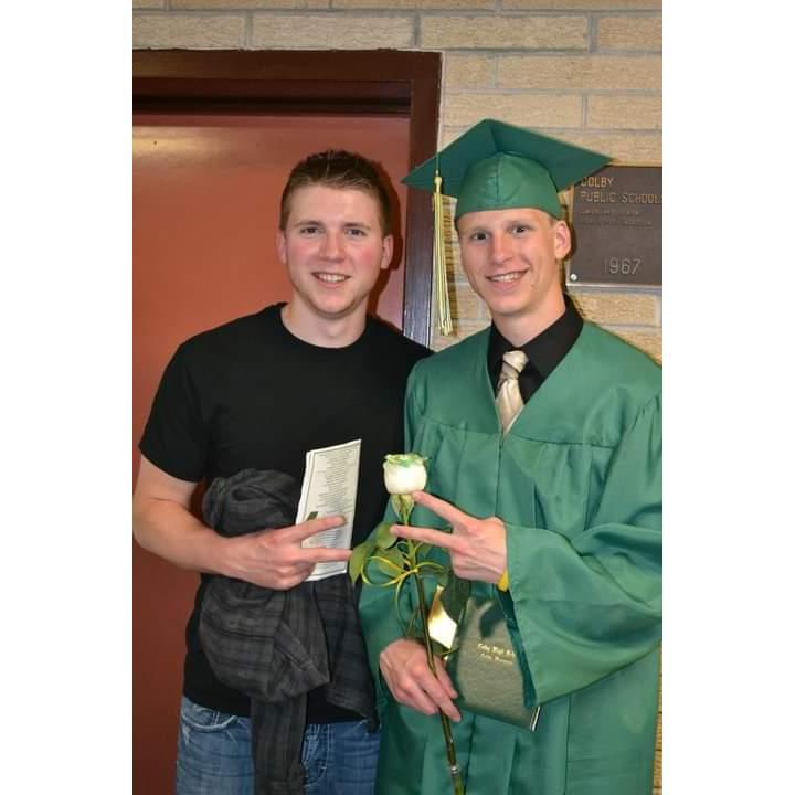 Kyle's HS graduation with his big brother by his side.