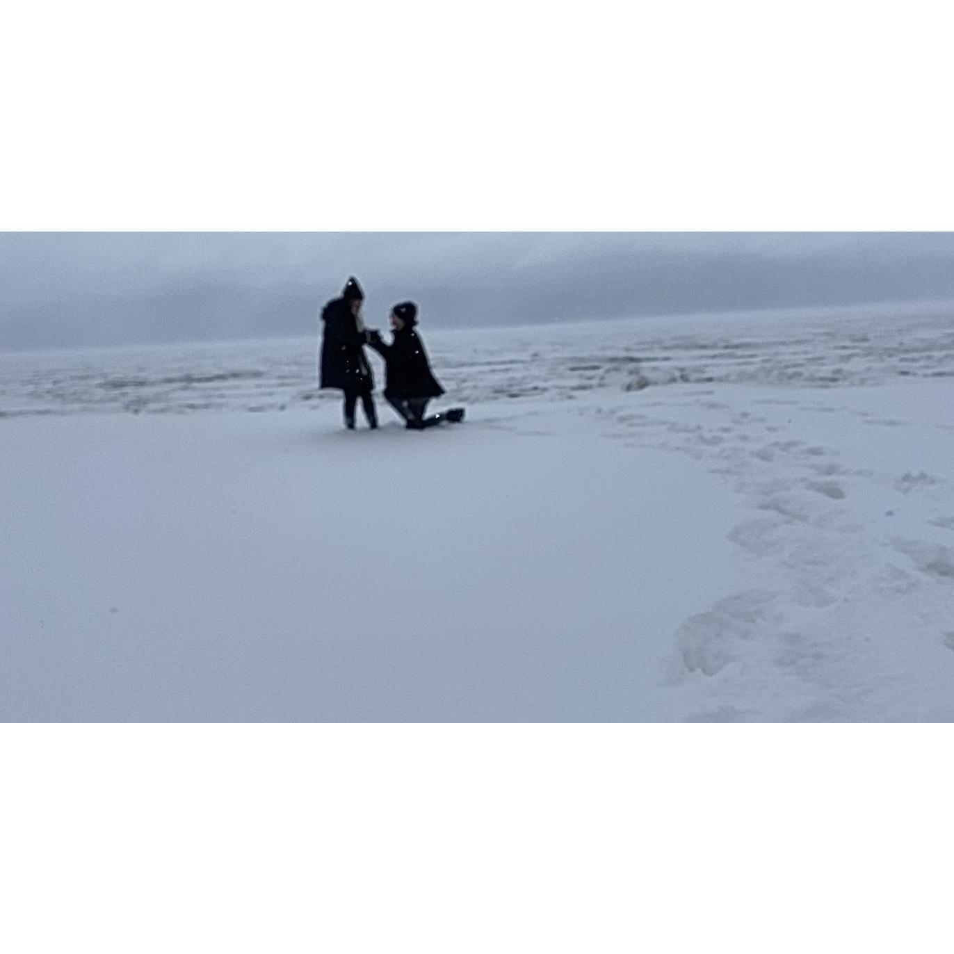 The (blurry) proposal on Oak street beach in Chicago! Feb 15, 2021