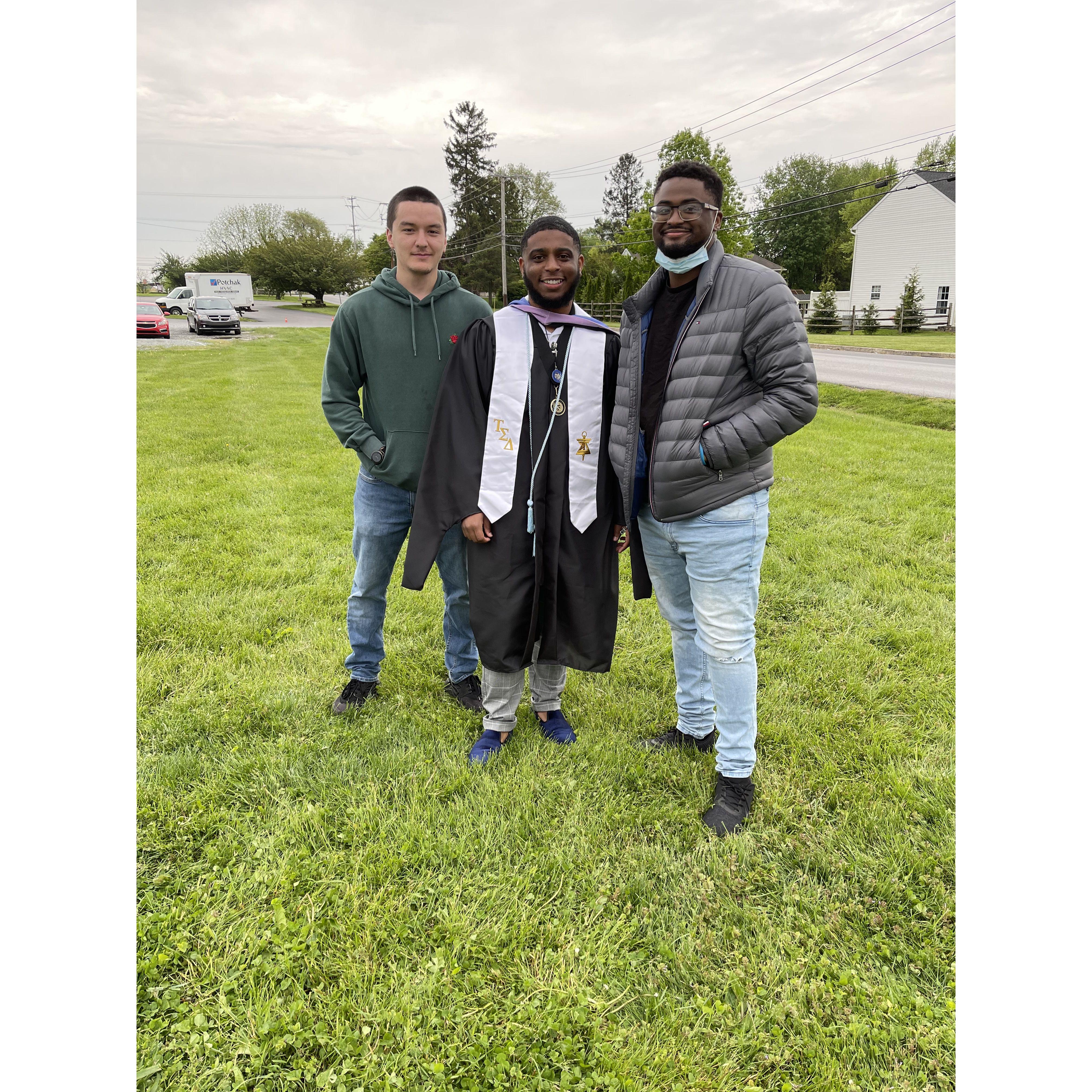 Robert, Mike, and Dom celebrating his college graduation!