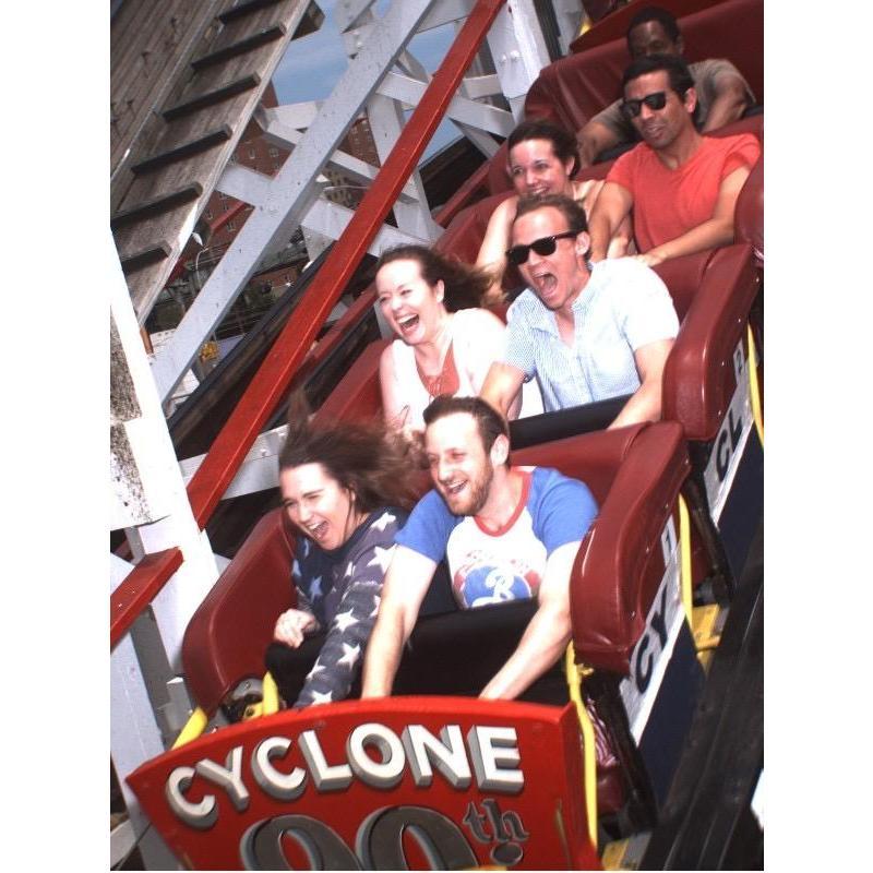 Adam laughing because he somehow found a way to get Brittany on a very questionable roller coaster where she would be scared and would need a hand to squeeze.