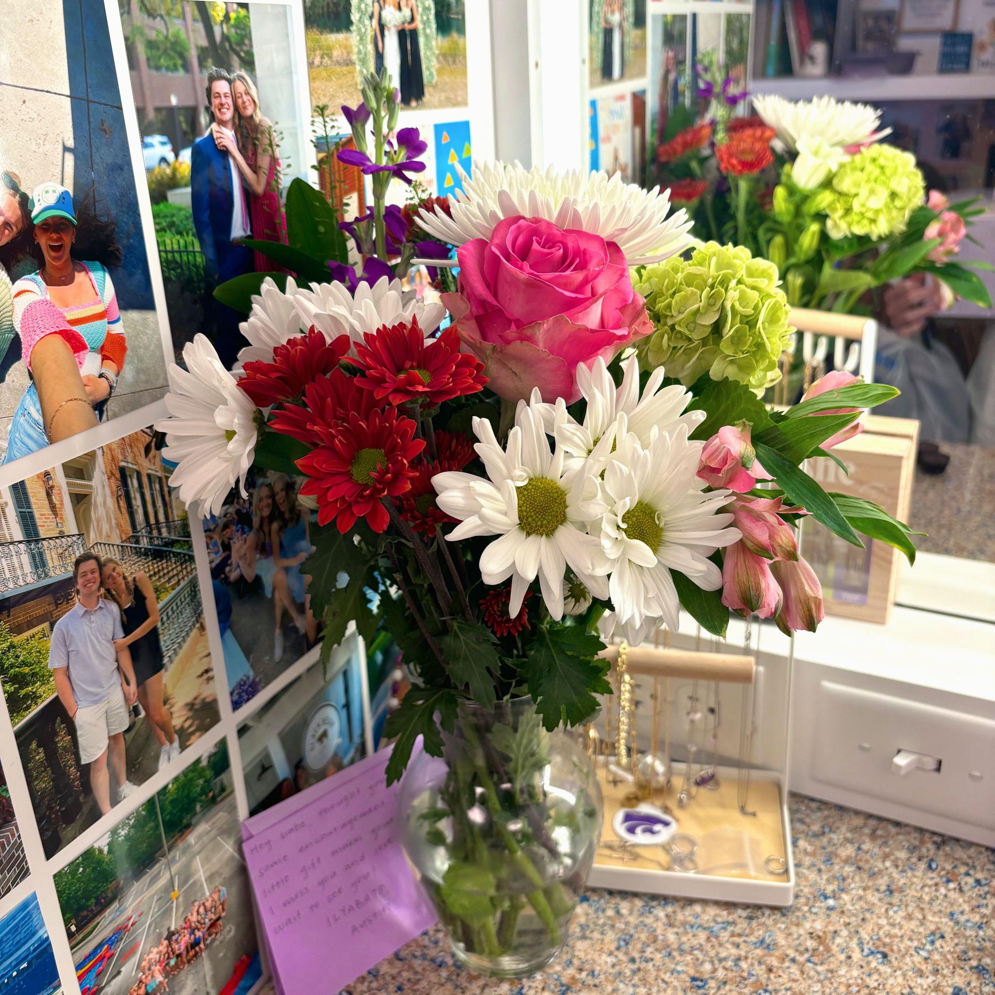 Austin's sweet floral deliveries to Taylor from 900 miles away, with a little help from Tay's friends:))