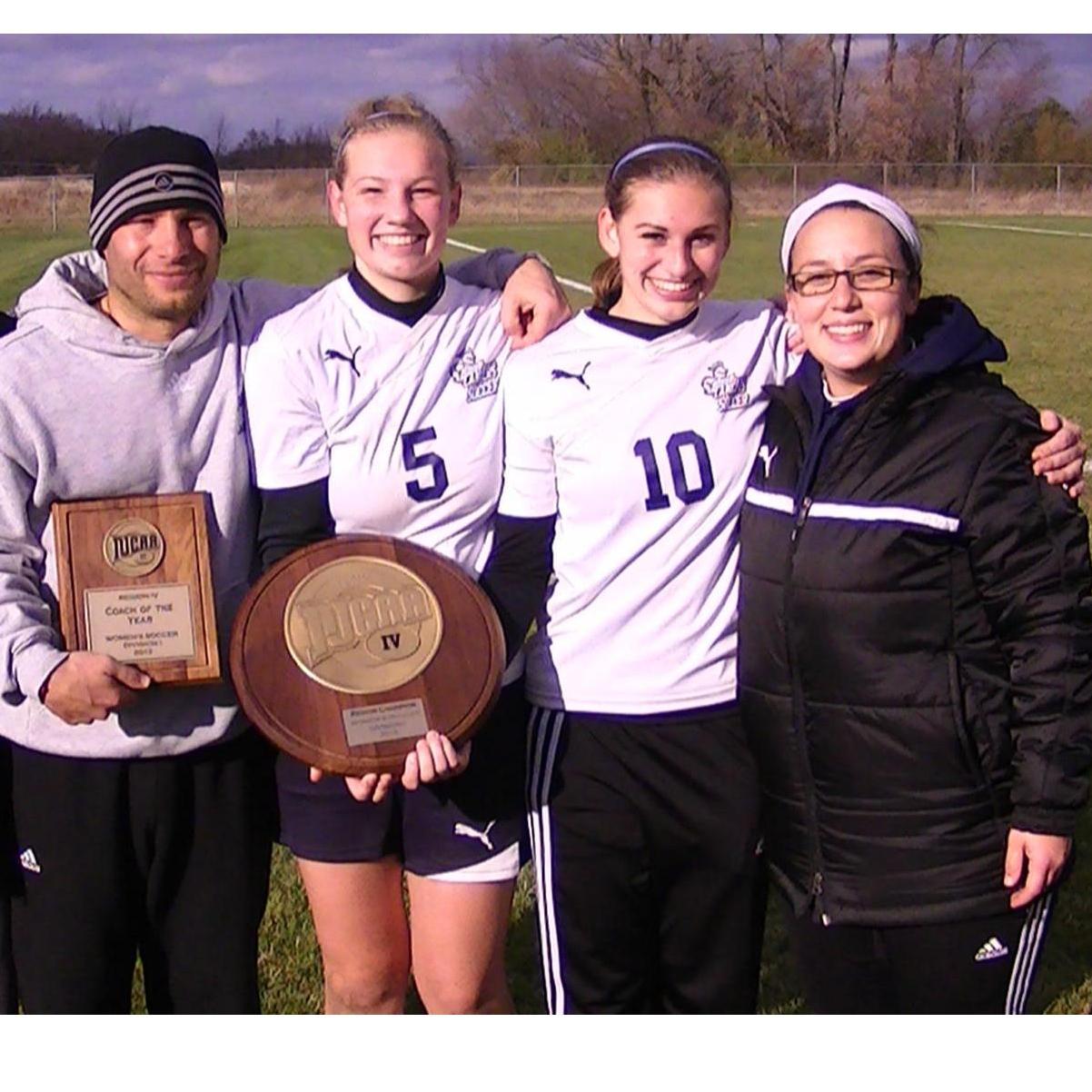 Elizabeth and Catie: Elizabeth was playing for College of Lake Country as a striker (#10). They won the league! (2013)