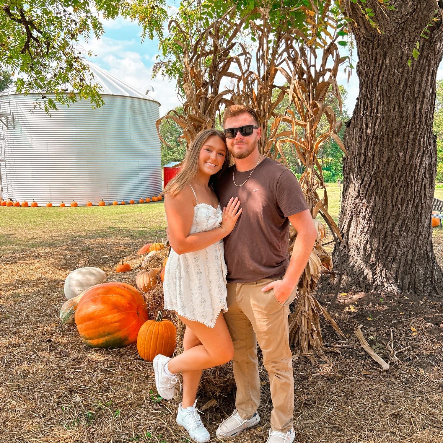We were sweating to death to get these "fall" pictures in 90 degree heat. Right after Noah moved Gracie out of her second story apartment into another place! He really doesn't get enough credit!