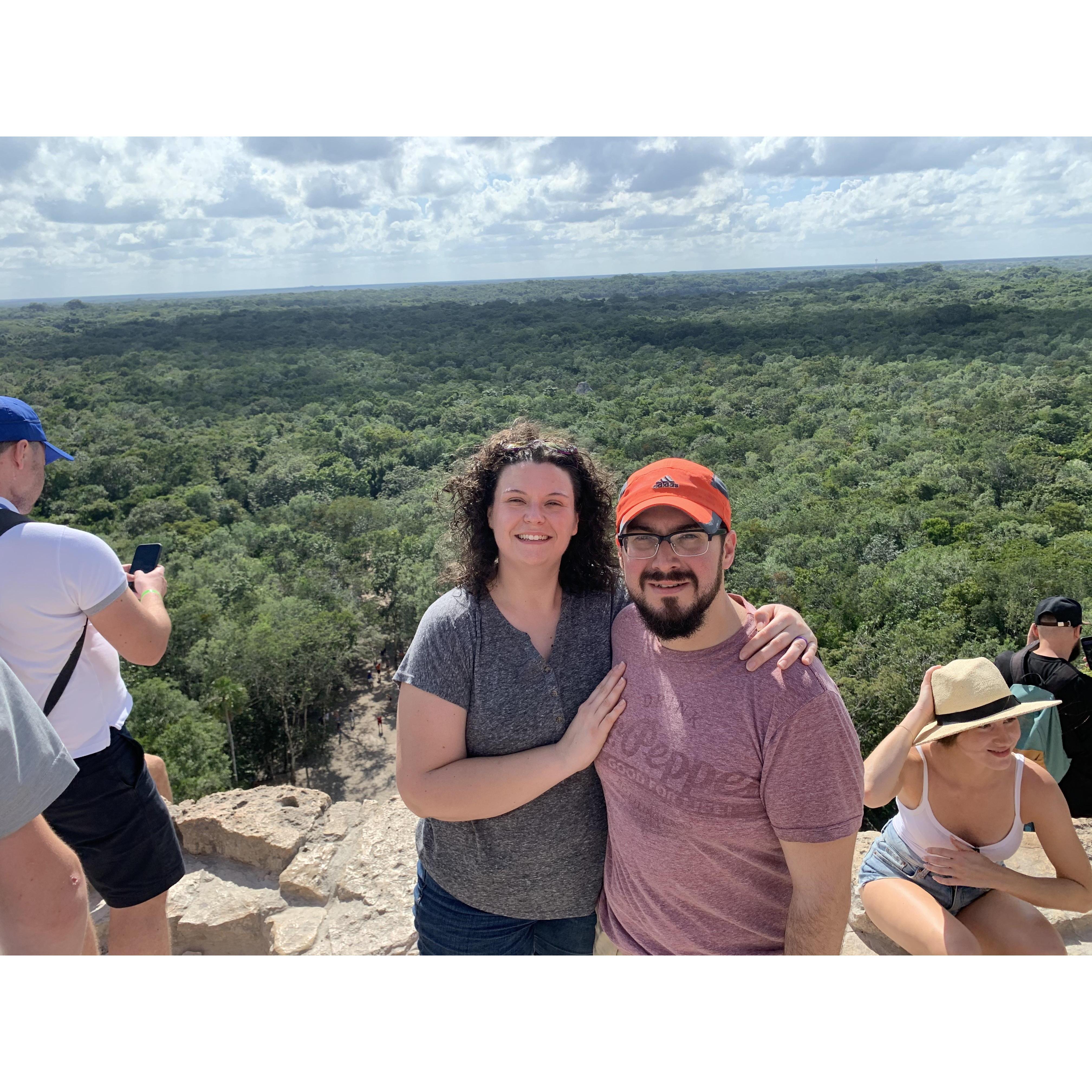 On our honeymoon, at the Coba ruins in Mexico after climbing the Ixmoja pyramid (120 steps, 138 feet tall)