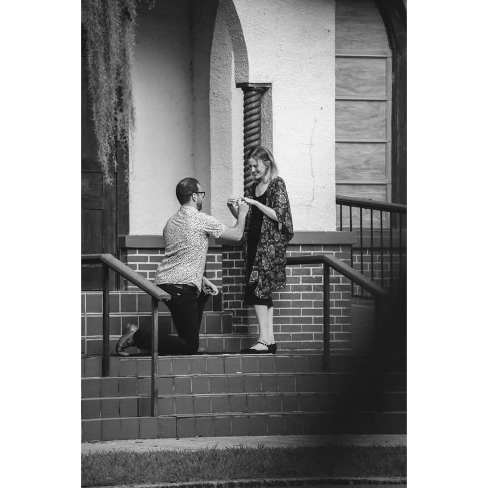 Putting on the ring that was 3 sizes too big at the time. (Justin did a really good job at guessing my ring size though. I have extremely slender fingers.)