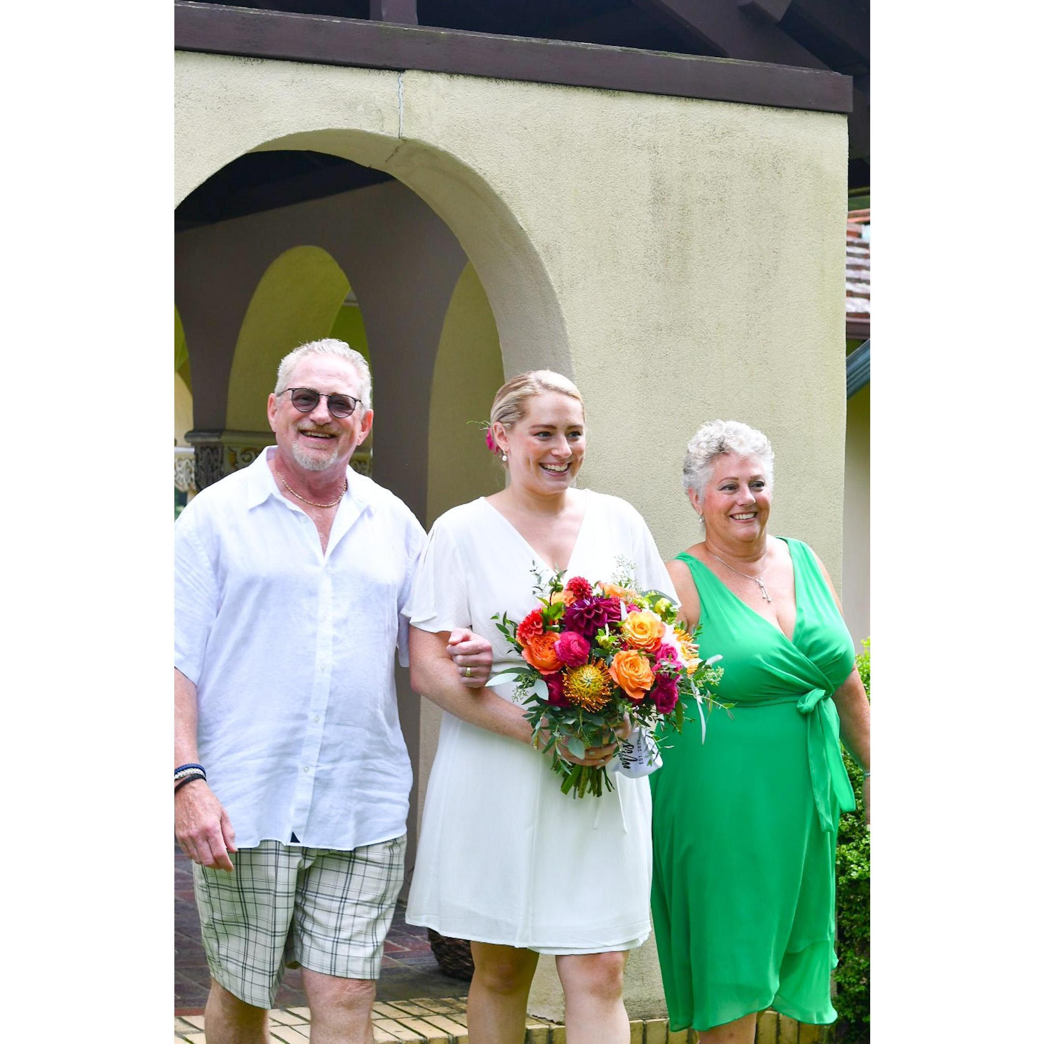 Dad and Mom walking me down the 'aisle'