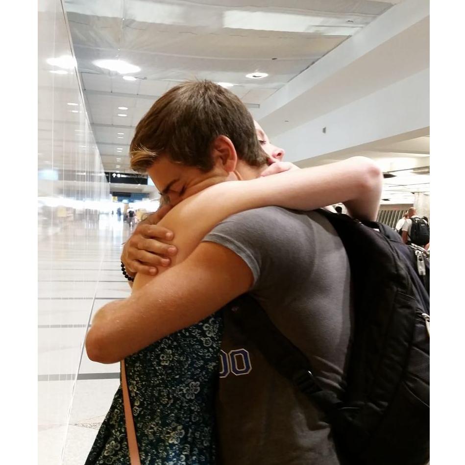 Michael returning home from his summer of drum corps in 2018.