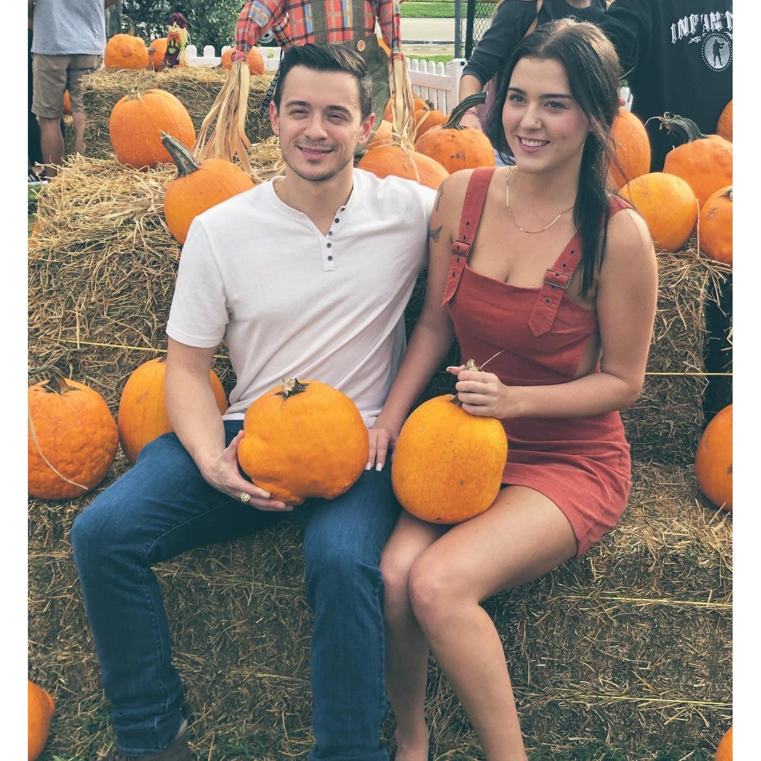 Posed picture from a pumpkin patch in Deerfield Beach, FL 2019.