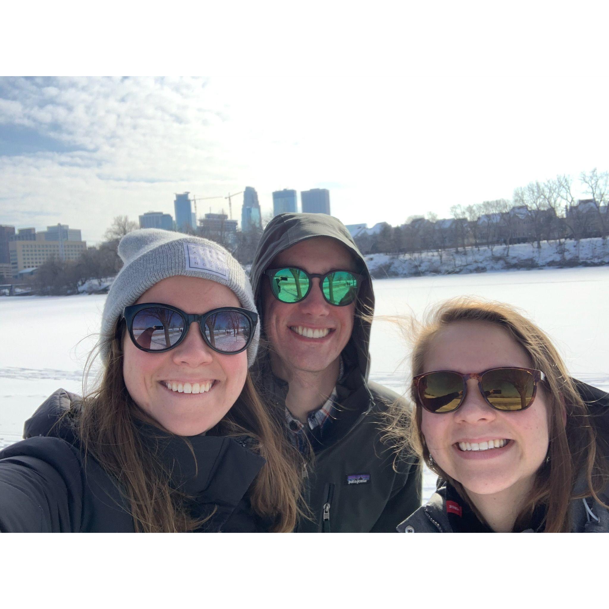 Walking along the Mississippi River with Annie's sister, Katie - 2021