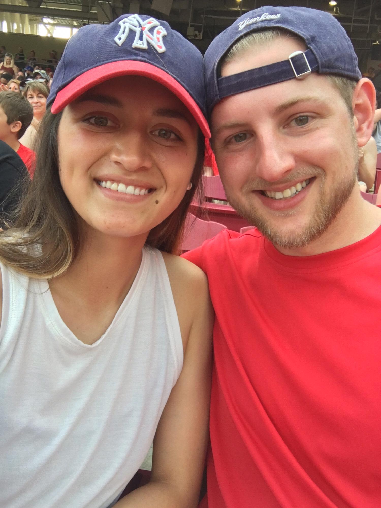 Reds game with our Yankees caps