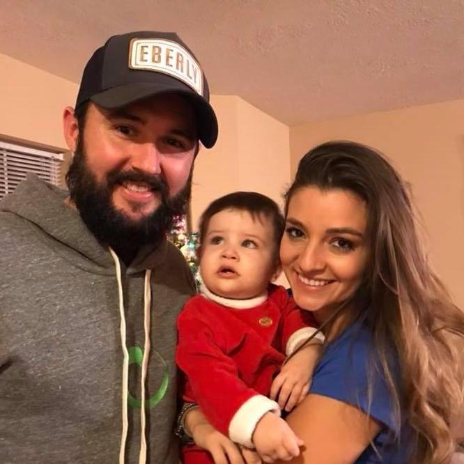 Us with our Godson, Mr. Burrito!