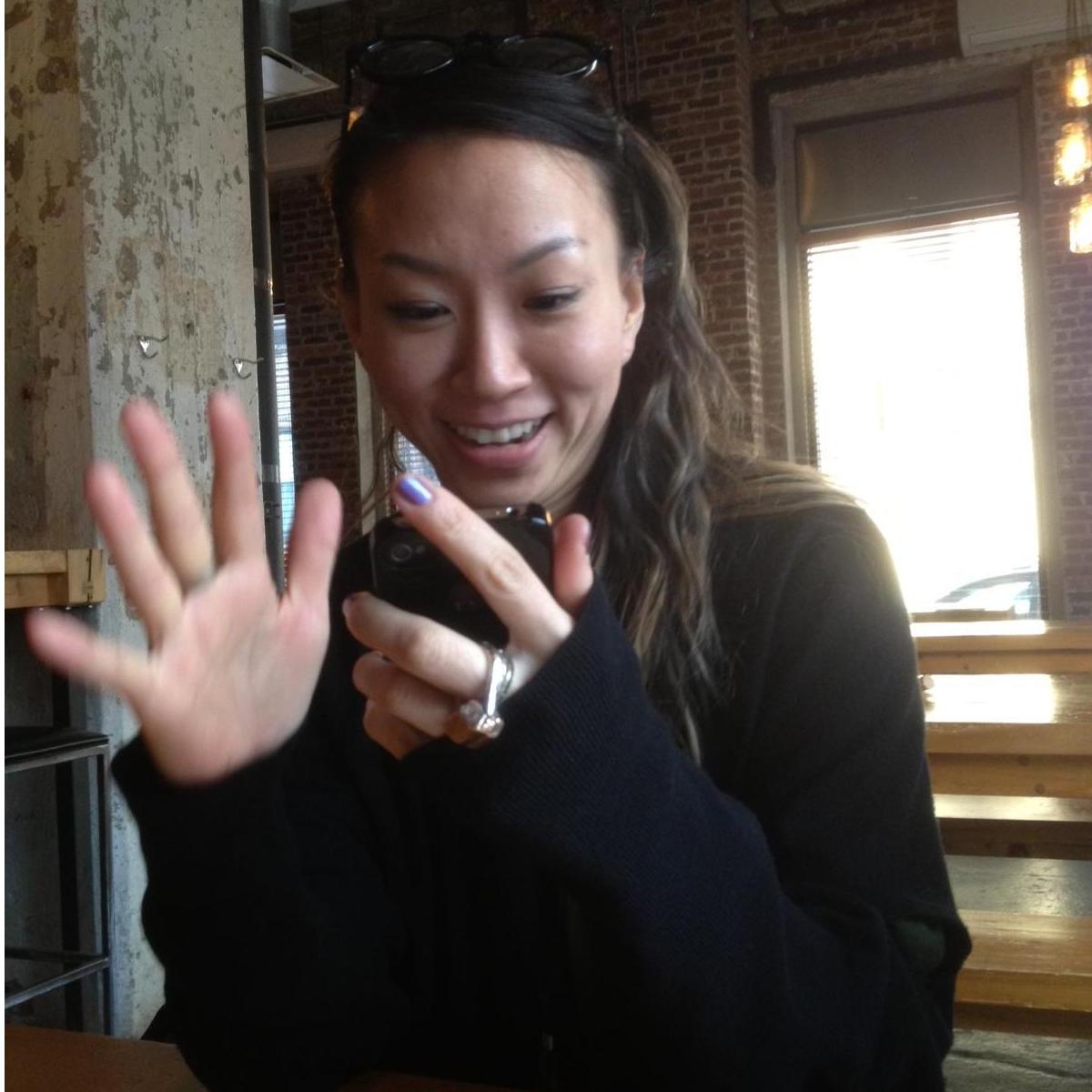 After our 1st date, Aram's excitement when she received Brian's text was accidentally caught by our friend Tricia while she was testing her new camera.