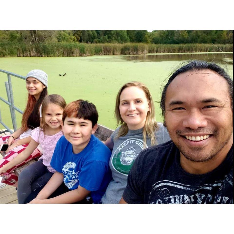 Sitting by the pond with the kids at Dodge Nature Center