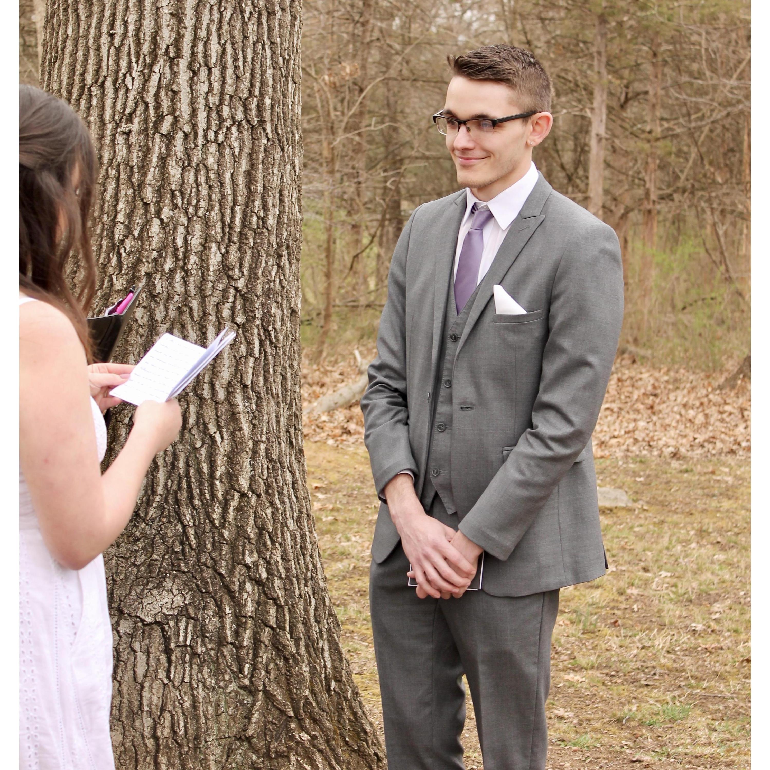 Alyssa reading her vows to Evan.