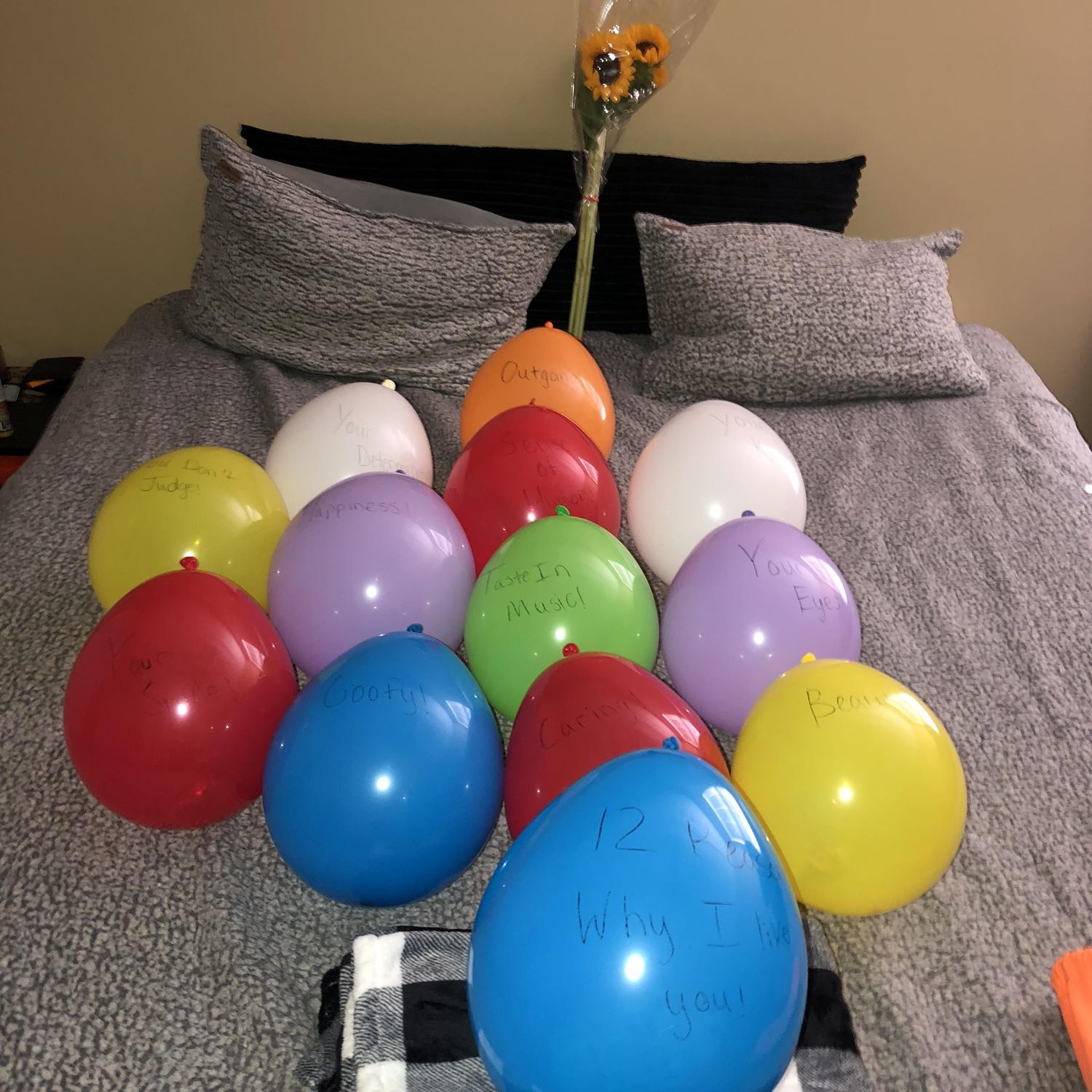 He laid out 13 Balloons that said what he likes about her and on the inside, was something that correlated to why he liked her. In the very last ballon was a note that said “Will you be my girlfriend”