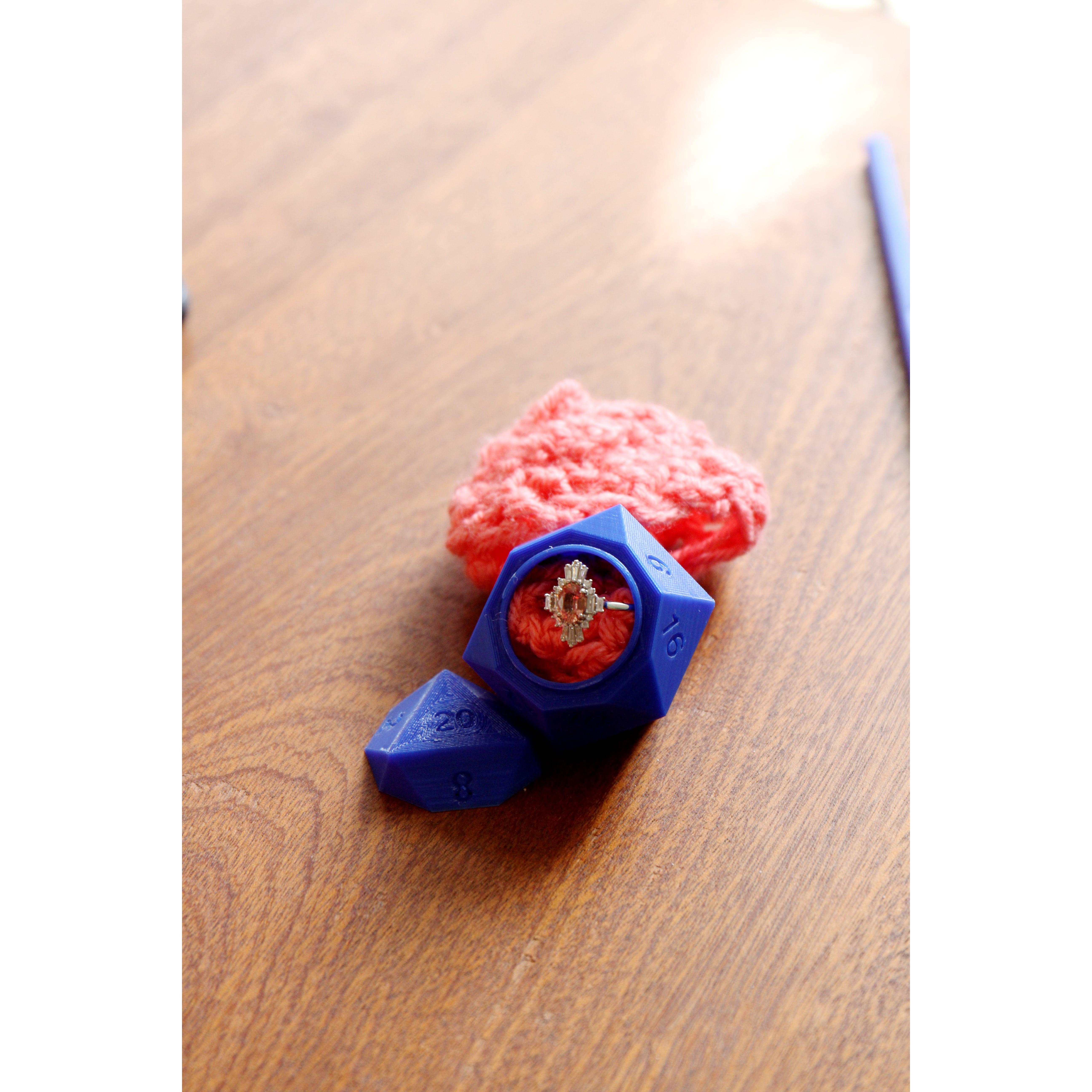 Dustin 3D printed crochet hooks and the dice ring box, and taught himself how to crochet 2 pouches to match the Padparadscha sapphire ring he picked