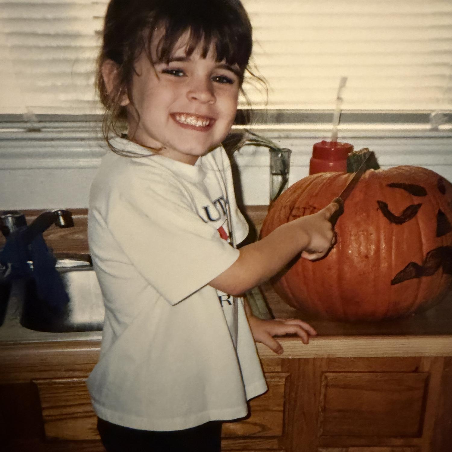 At this age, Krystin loved helping out in the kitchen.