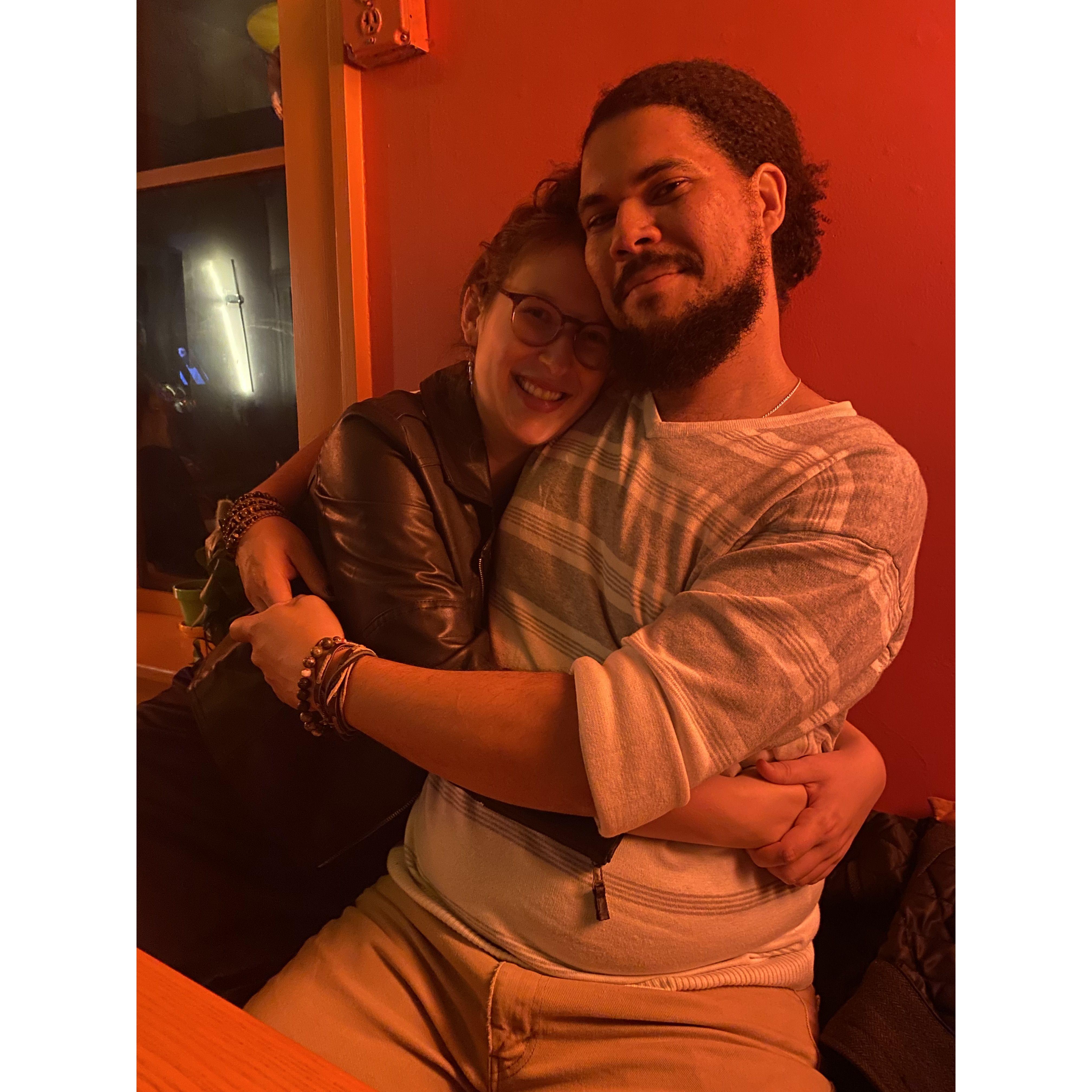 "that's a photograph of a man and a woman in an embrace" -Chris