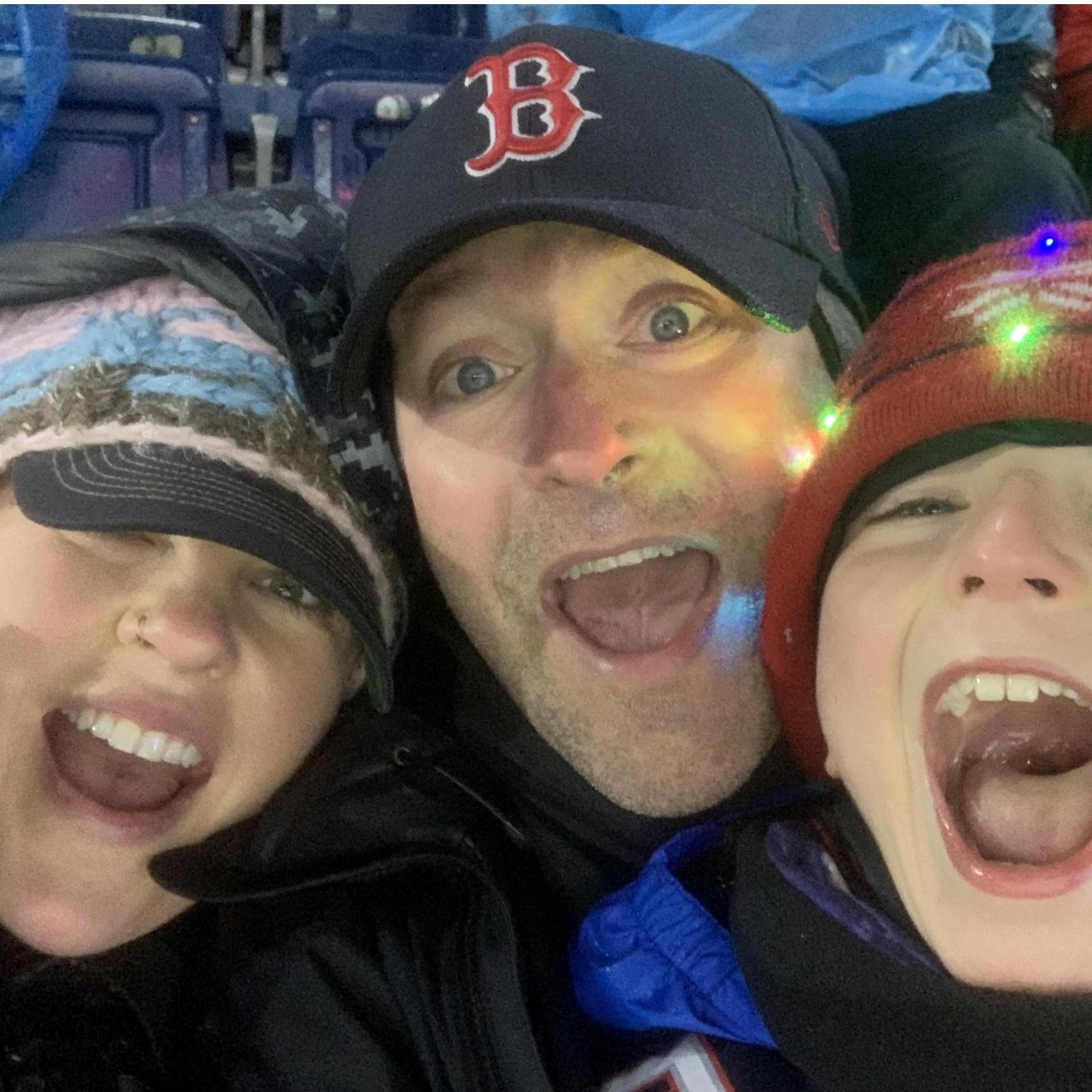 PG, Michelle & James at the very wet and cold Patriots vs. Cowboys game.