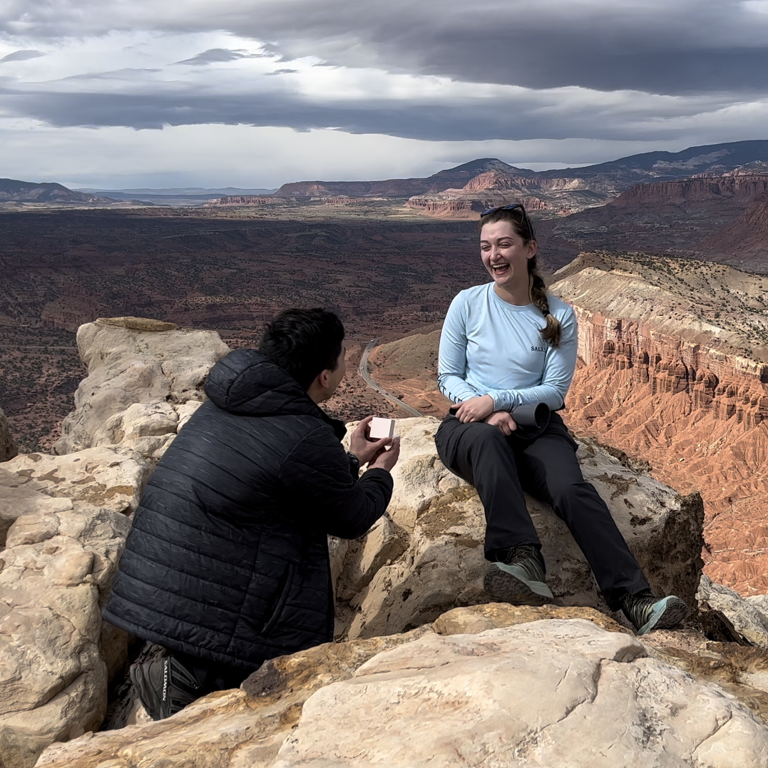 Ryan surprising Michelle at the top of the Navajo Knobs summit in Capitol Reef National Park, 2021