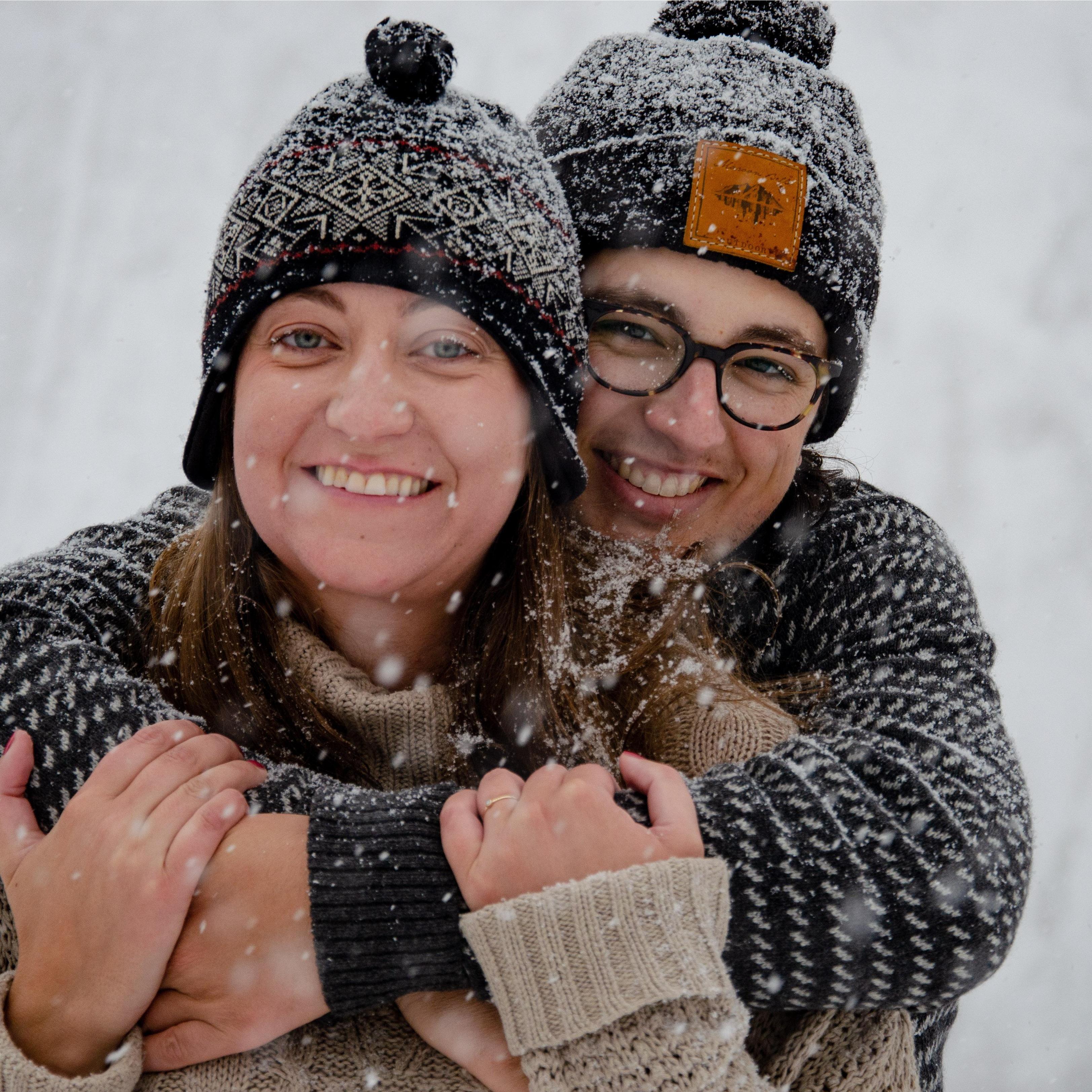 Hugging in the snow to stay warm of course.