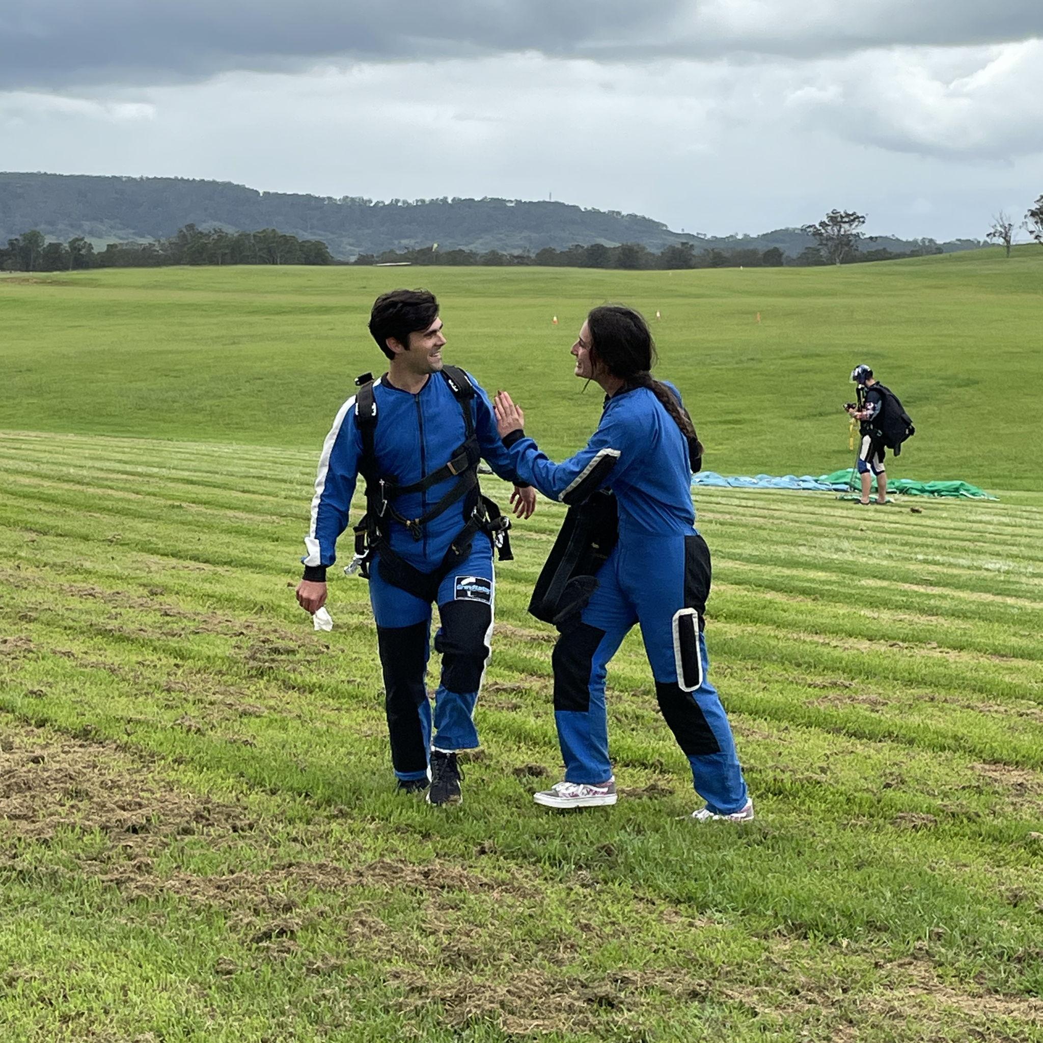 James and Charlotte after skydiving! Charlotte backflipped out of the plane. James threw up because he spun too many times after the parachute was deployed.