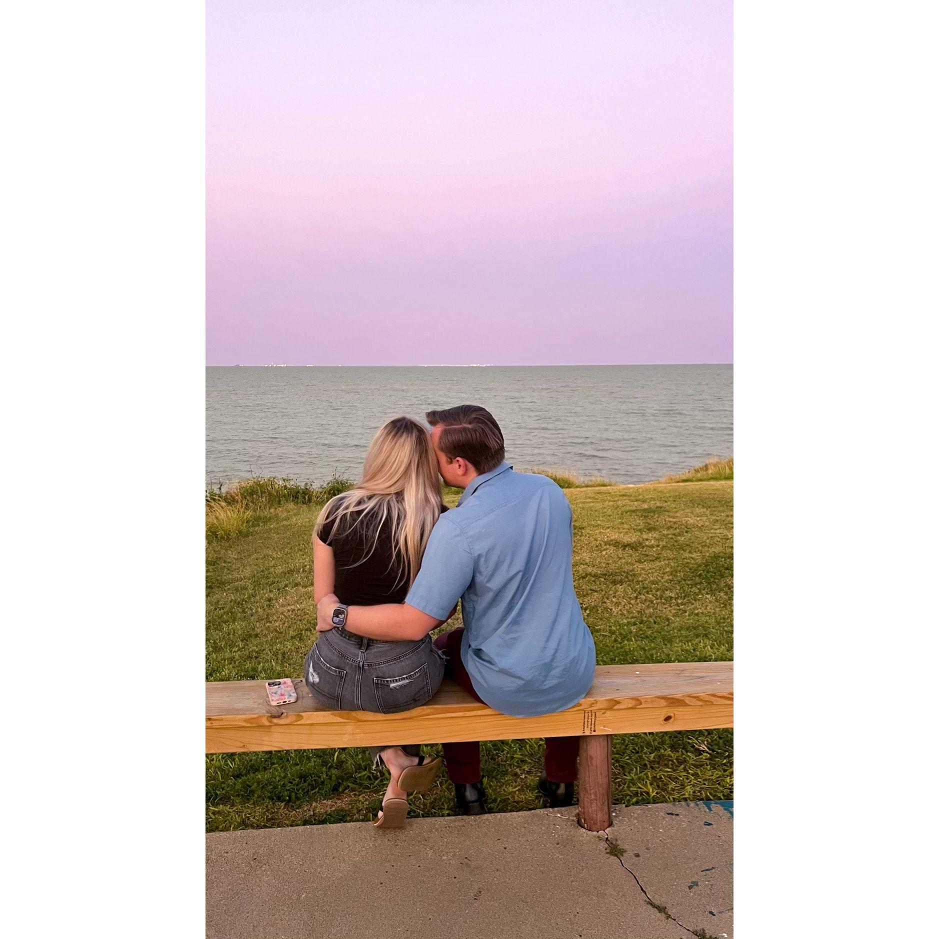 Liz's favorite photo. Her favorite place to sit when graduate school became overwhelming. The ocean, the sunset, and the love of her life always always always made it better