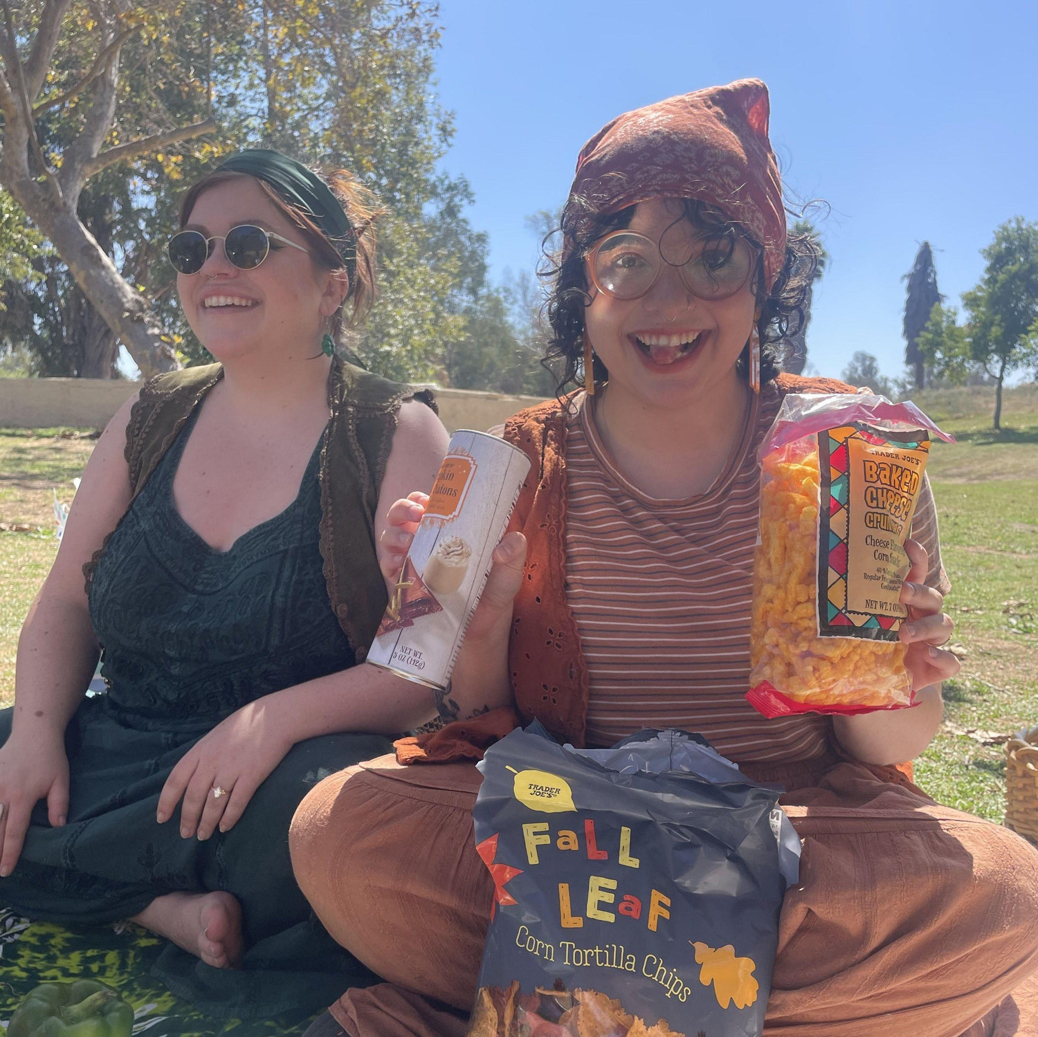 Celebrating our engagement with a monochromatic picnic (Sophie showing off her orange outfit + orange snacks)