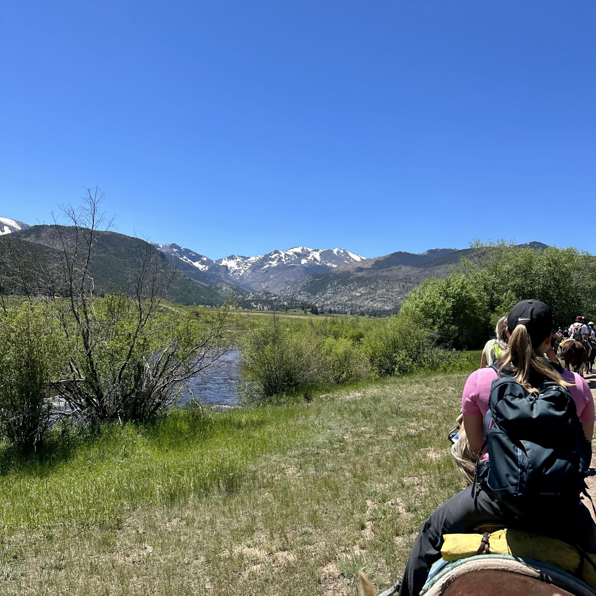 Riding horses through Rocky Mountain National Park