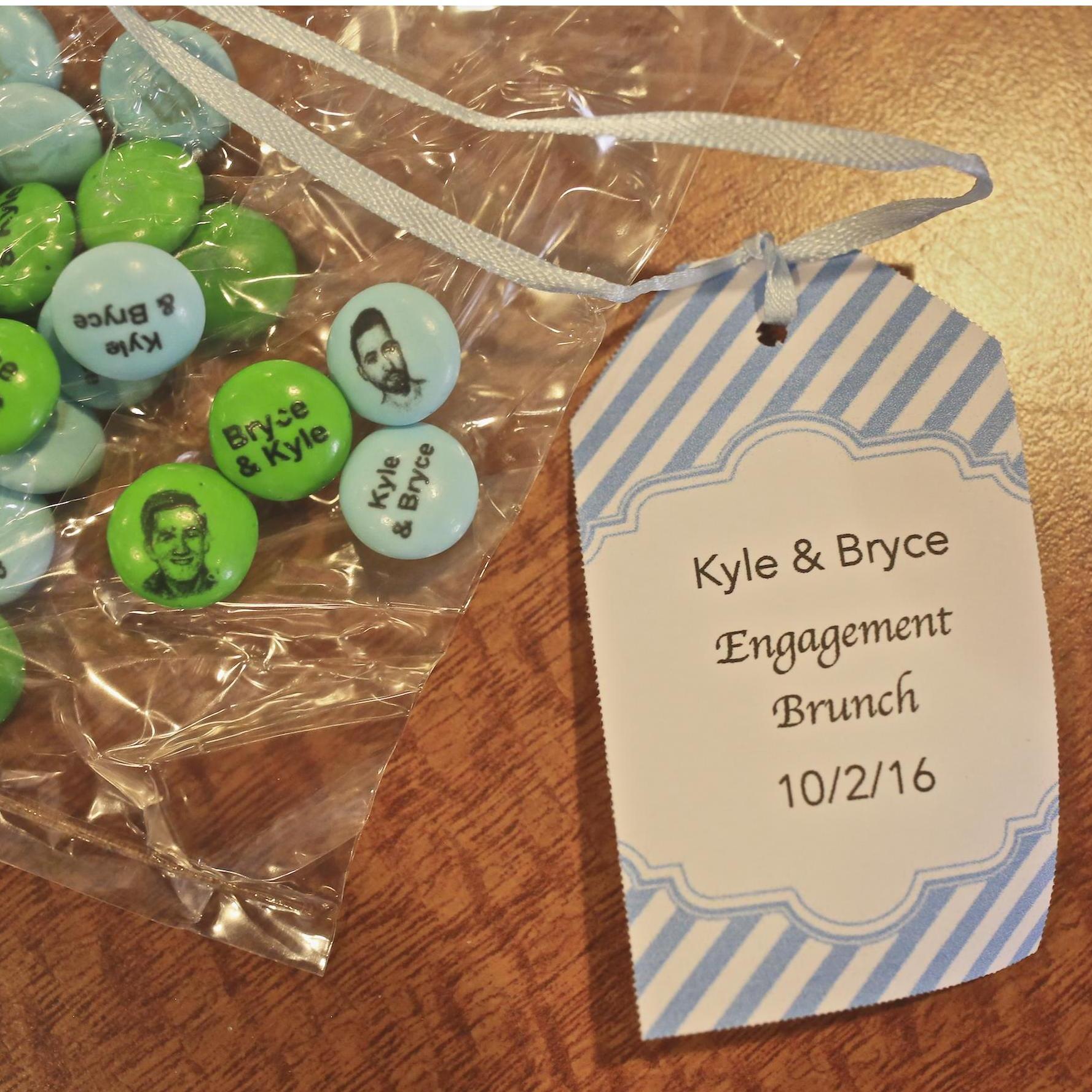 Our favors at the Engagement Brunch were champagne flutes with little bags of M&Ms inside that had our faces on them!