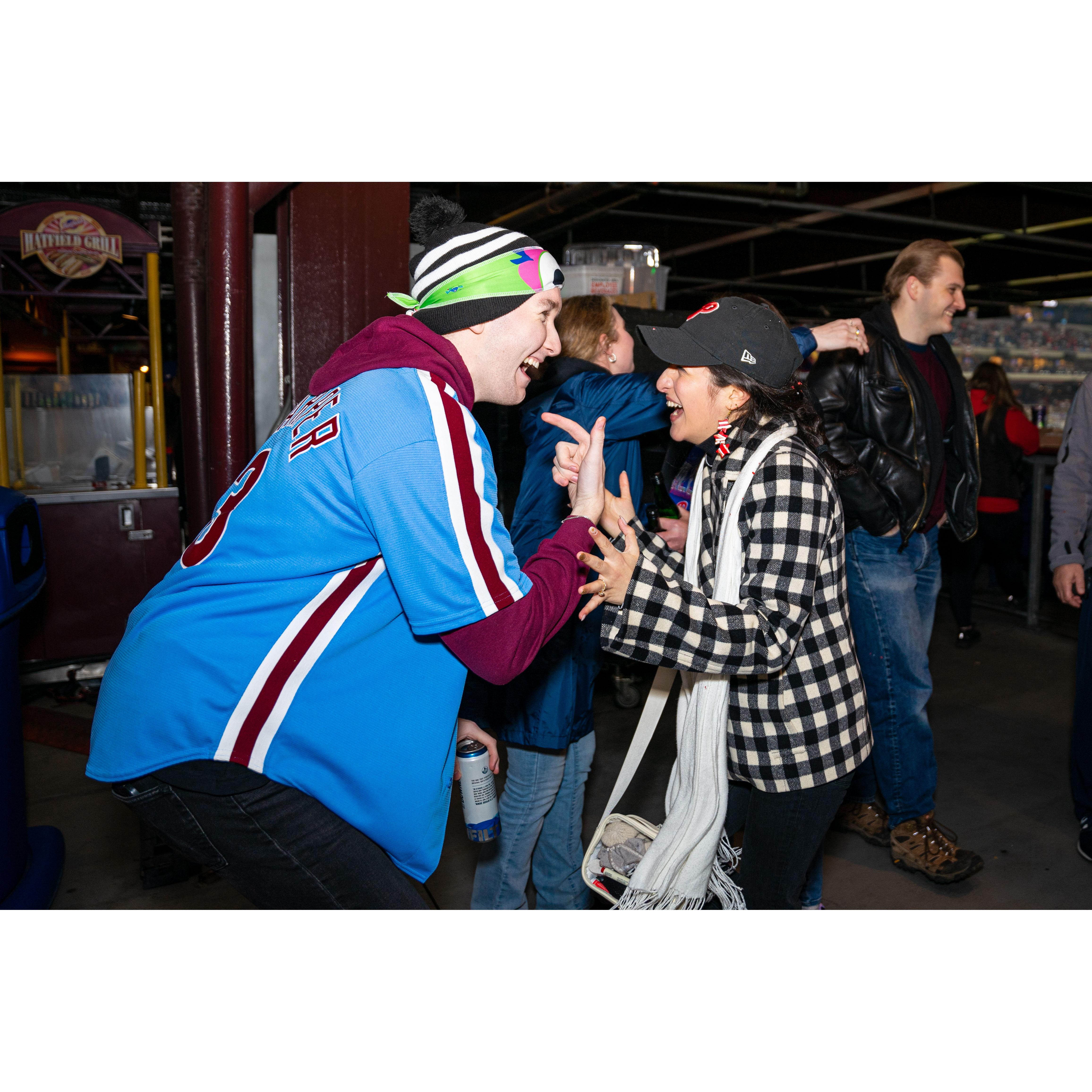 The couple's friend, Eric Meyer, freaking out with Yolany right after the engagement.