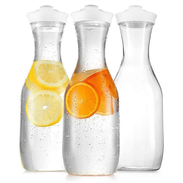 Plastic Carafe Water Pitcher - Carafes for Mimosa Bar - Clear Juice Containers with Flip Top lids - Narrow Neck for Easy Grip Wide Mouth - Juice carafe for Parties – BPA Free - Not Dishwasher Safe