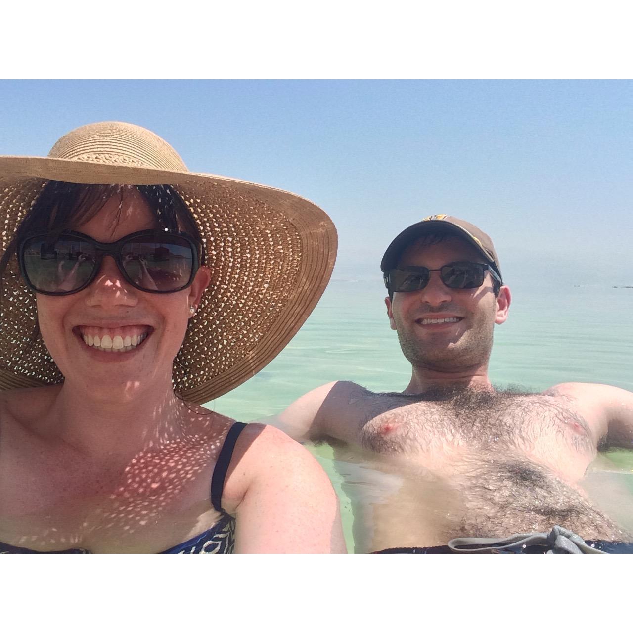 Casually floating in the Dead Sea.