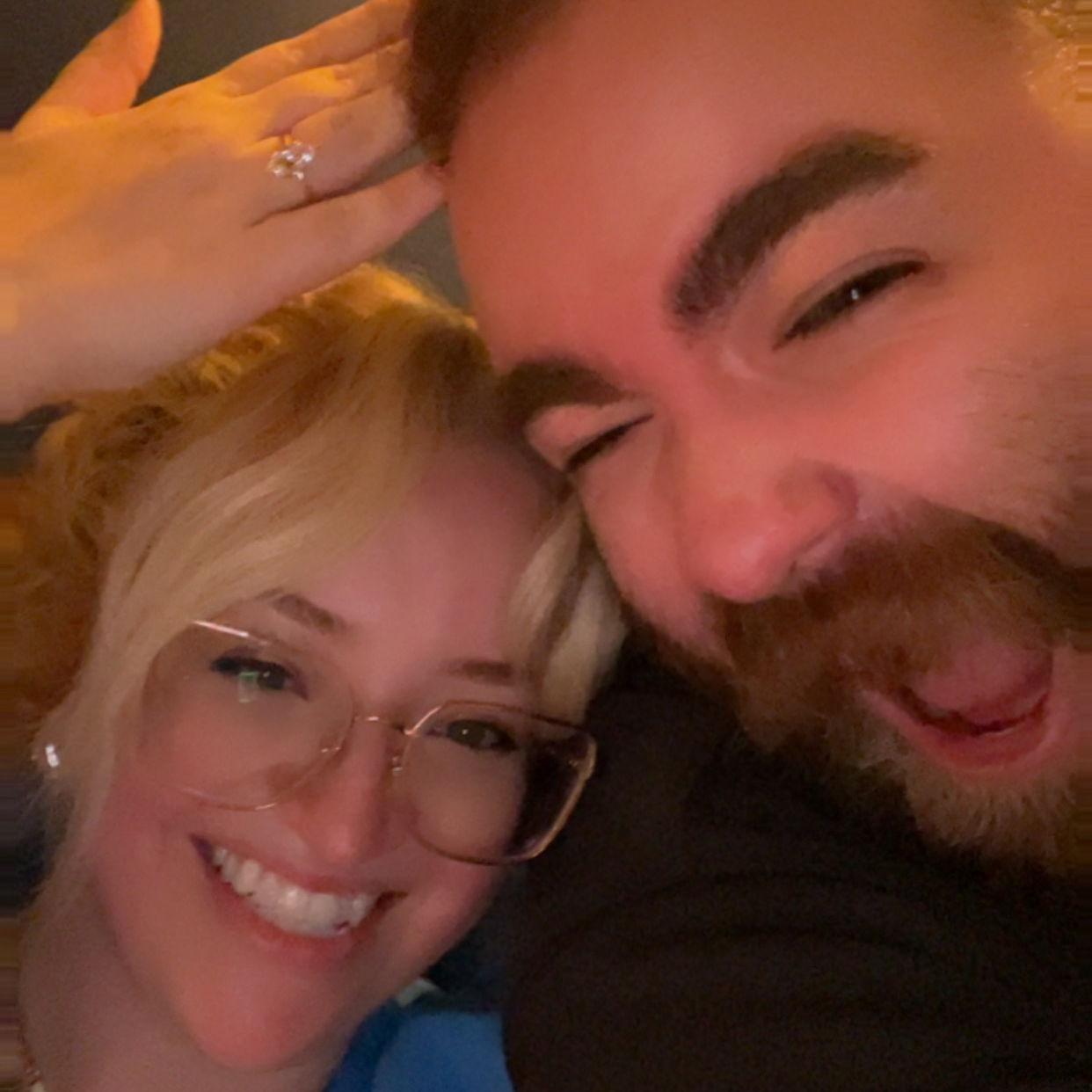 This was us sending pictures of the ring to family farther away, sharing the good news.