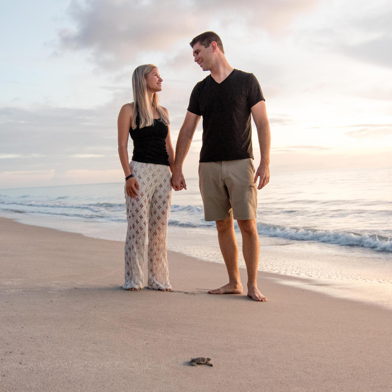 We had the unique opportunity to do an engagement/save the date photo shoot the same morning Amanda was required to release hatchlings from her previous survey. MTP#20-261. No turtles were harmed!
