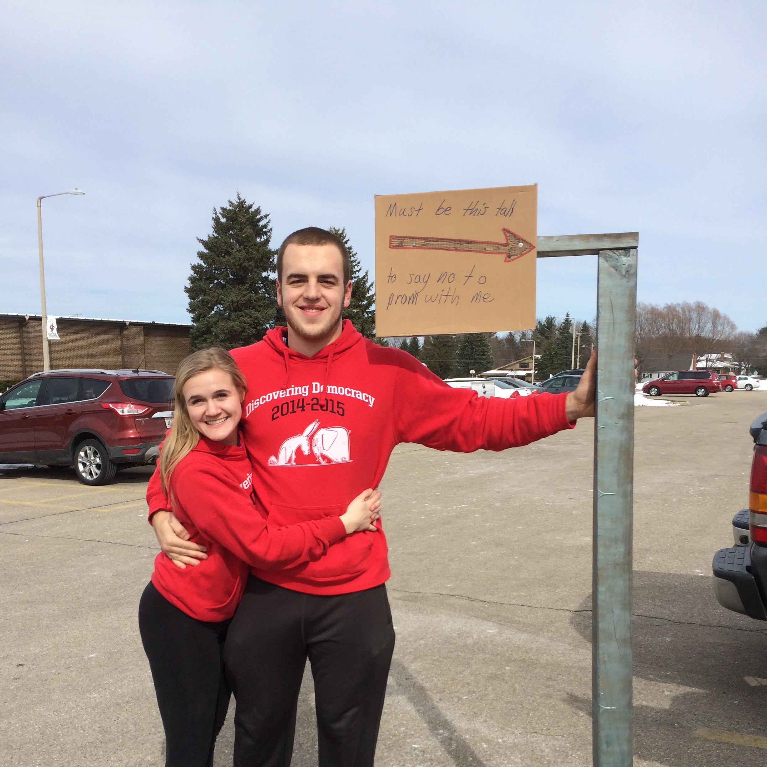 Being high school sweethearts, we got the chance to go to 3 school dances together. This was Hunter's most creative prom-posal, the sign says, "Must be this tall to say no to prom with me"