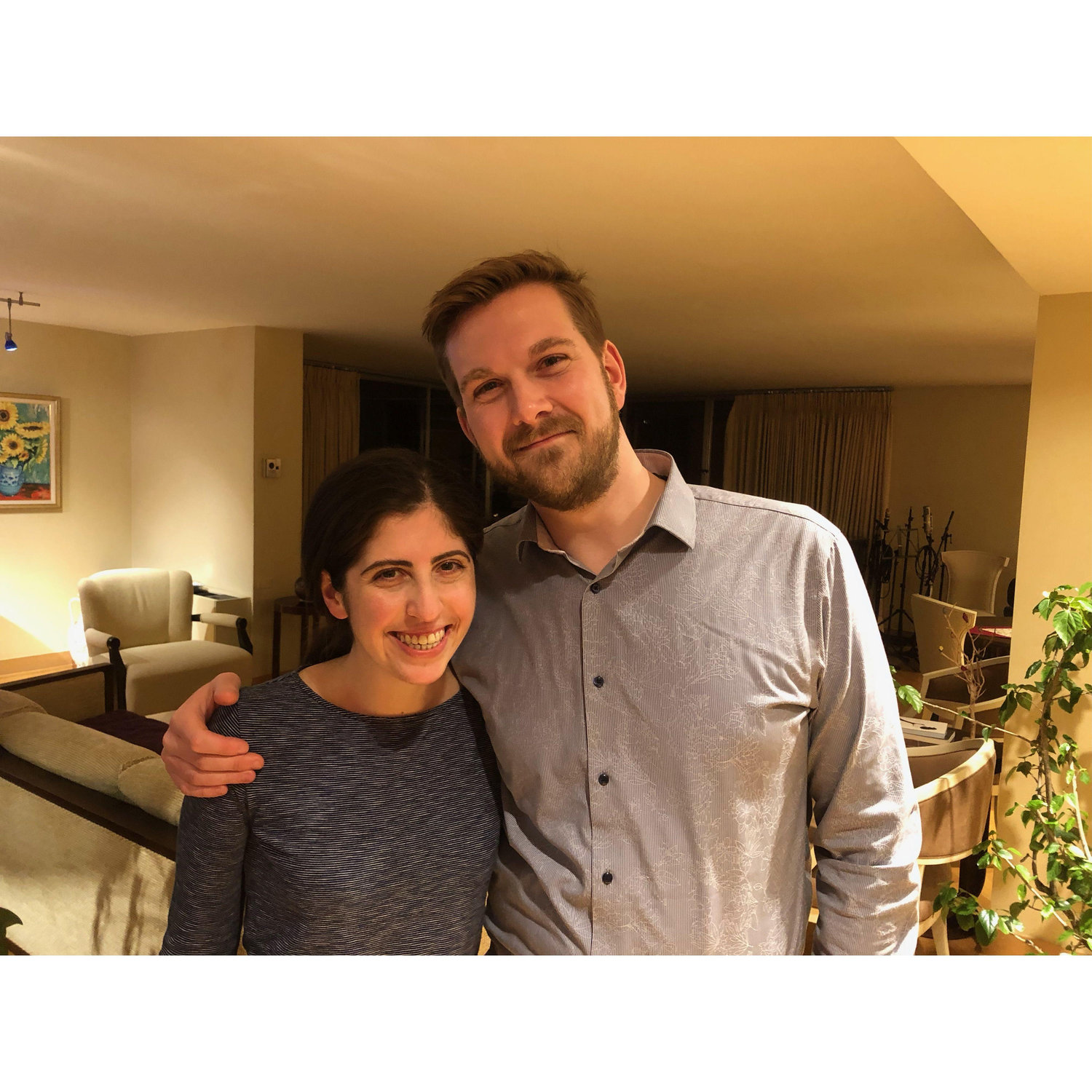 Us in Sarah's Aunt and Uncle's - Susan and John's - Chicago apartment. Conveniently located steps from our wedding venue!