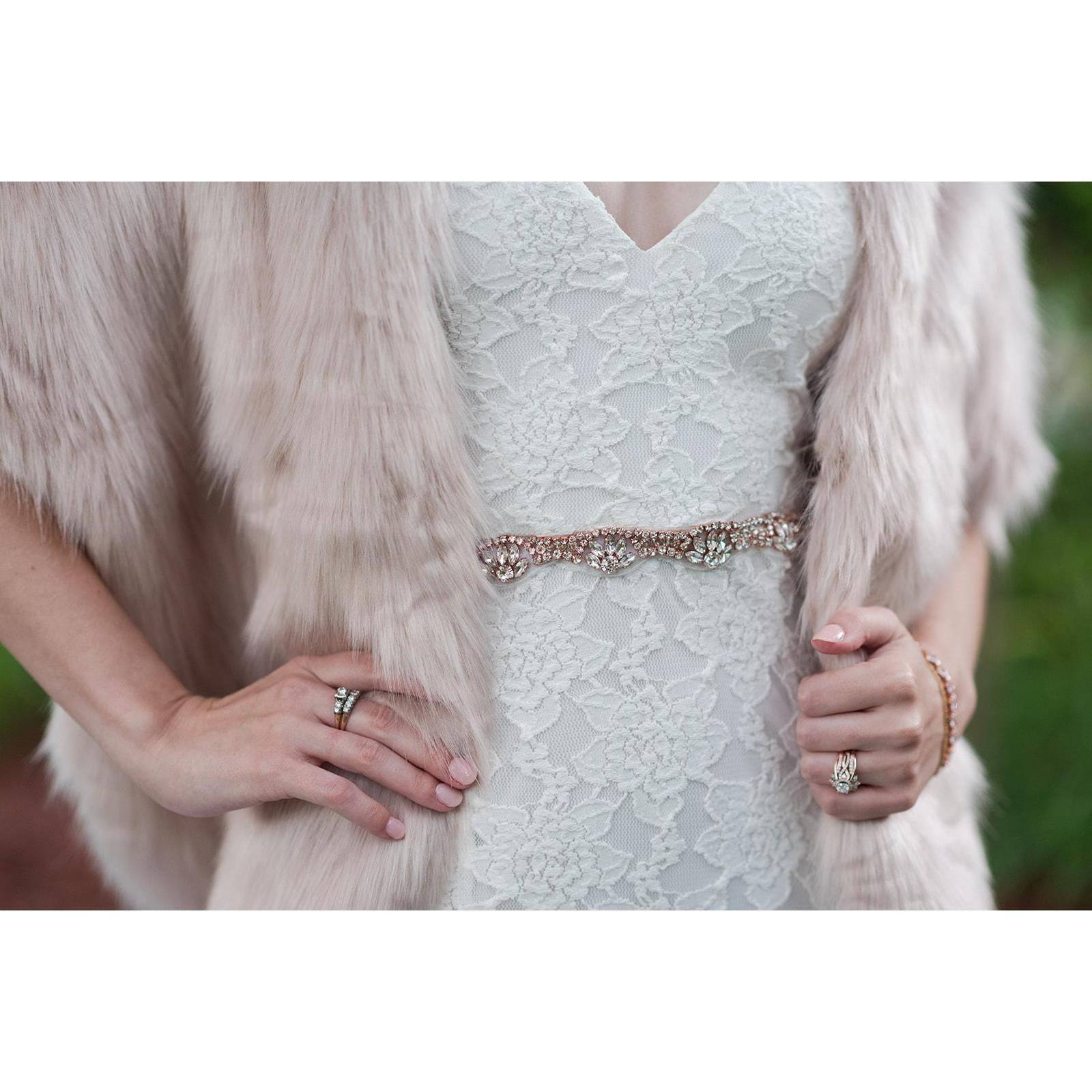 Sarah wore her grandmother's wedding rings on her right hand.