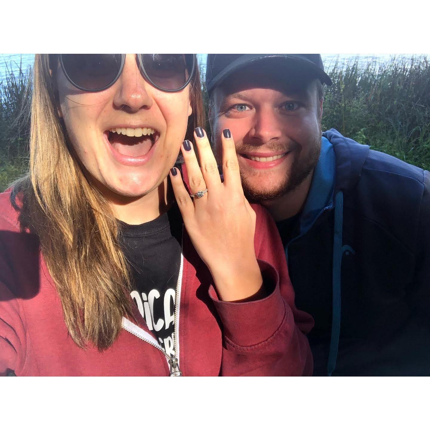 Our engagement! Such a surprise walking Archie by the lake!