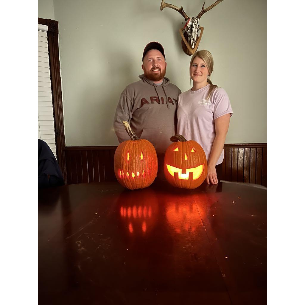 One of the couple's first dates - pumpkin picking and carving!