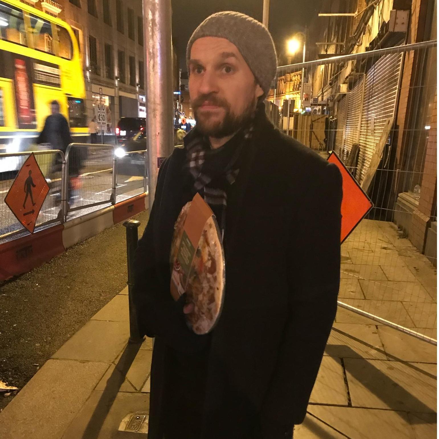 Walking around Ireland with a frozen pizza.