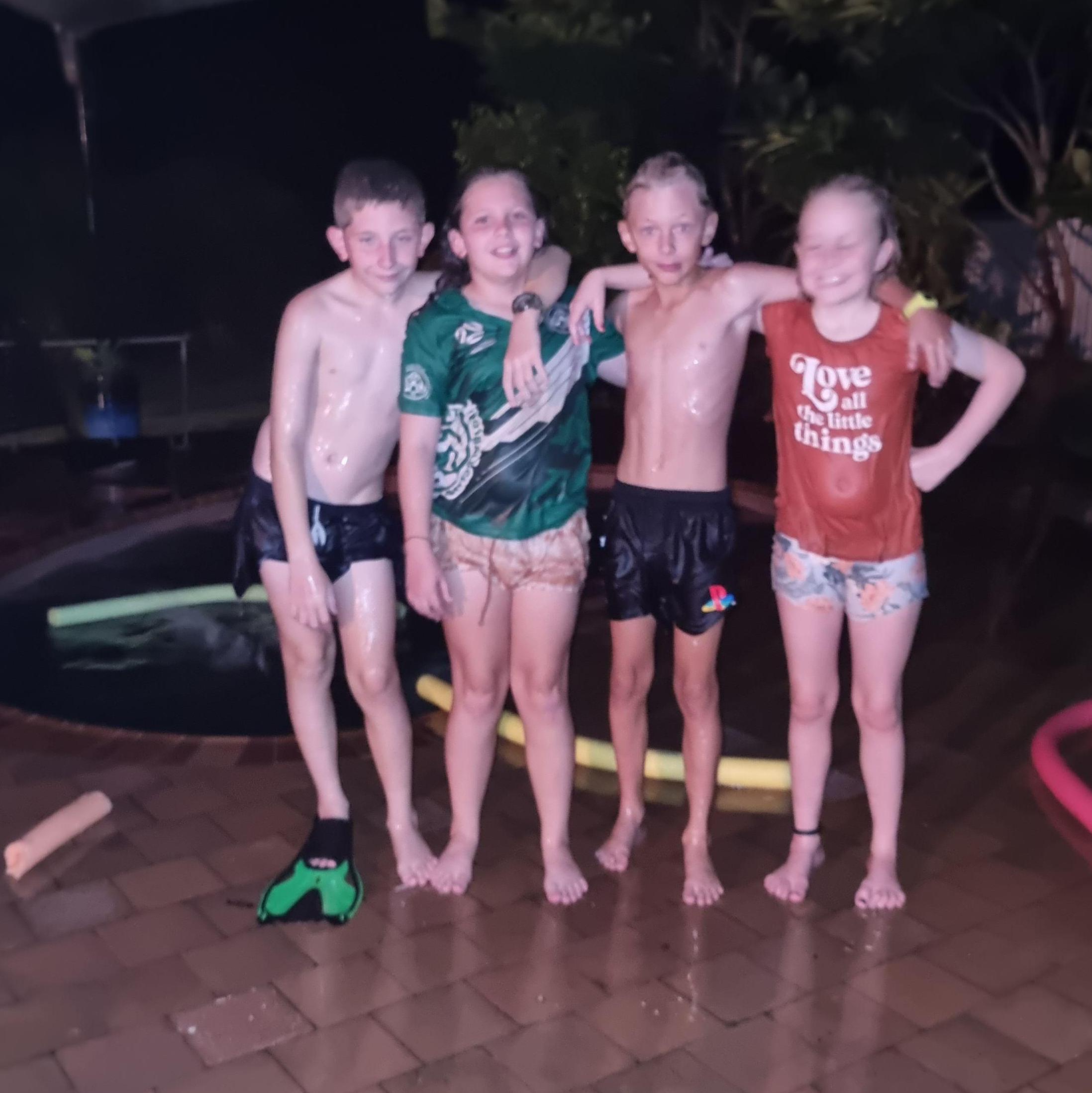 The young bridal party enjoying some late night swims in tropical Darwin