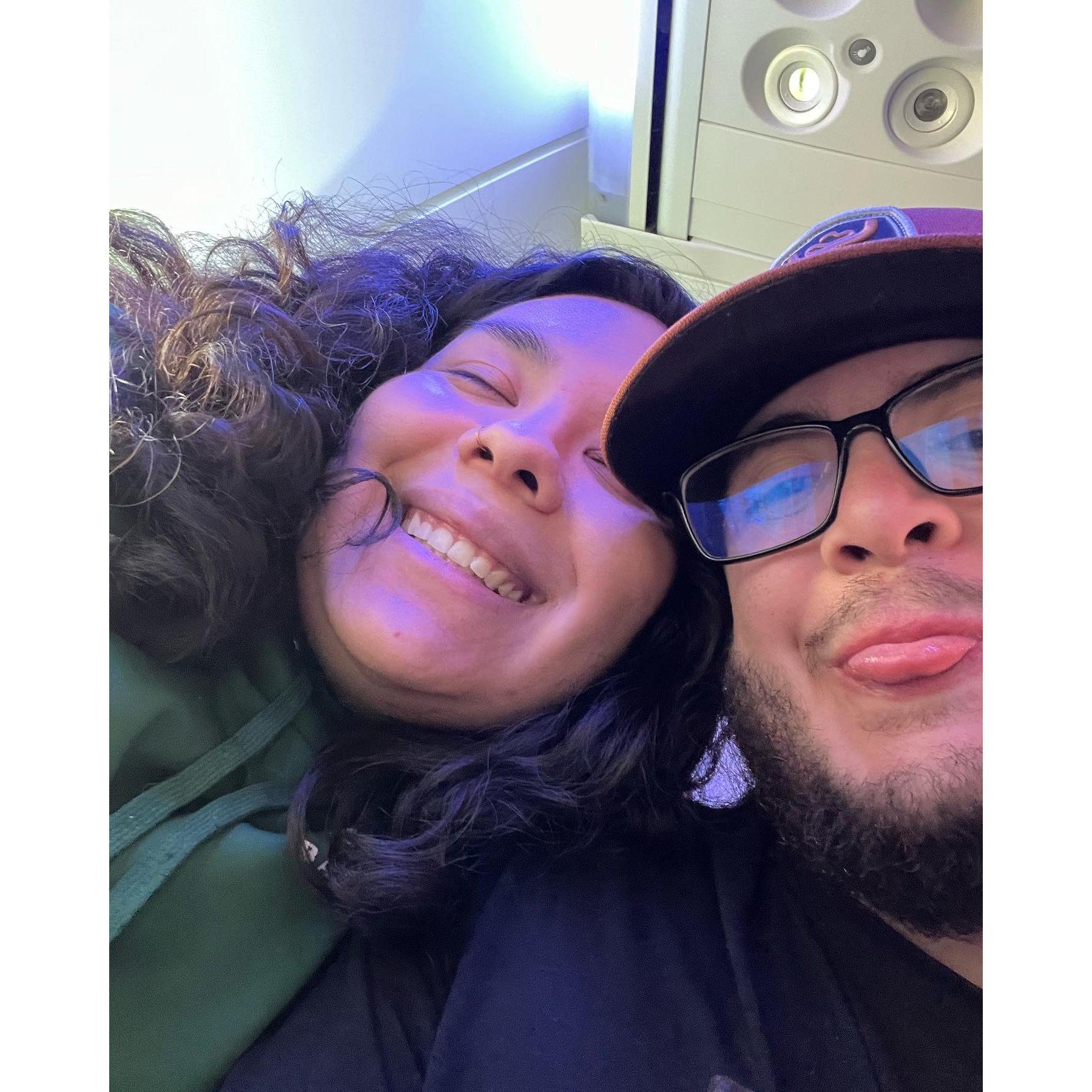 On the plane to Florida for Disney World trip with Alejandra's family