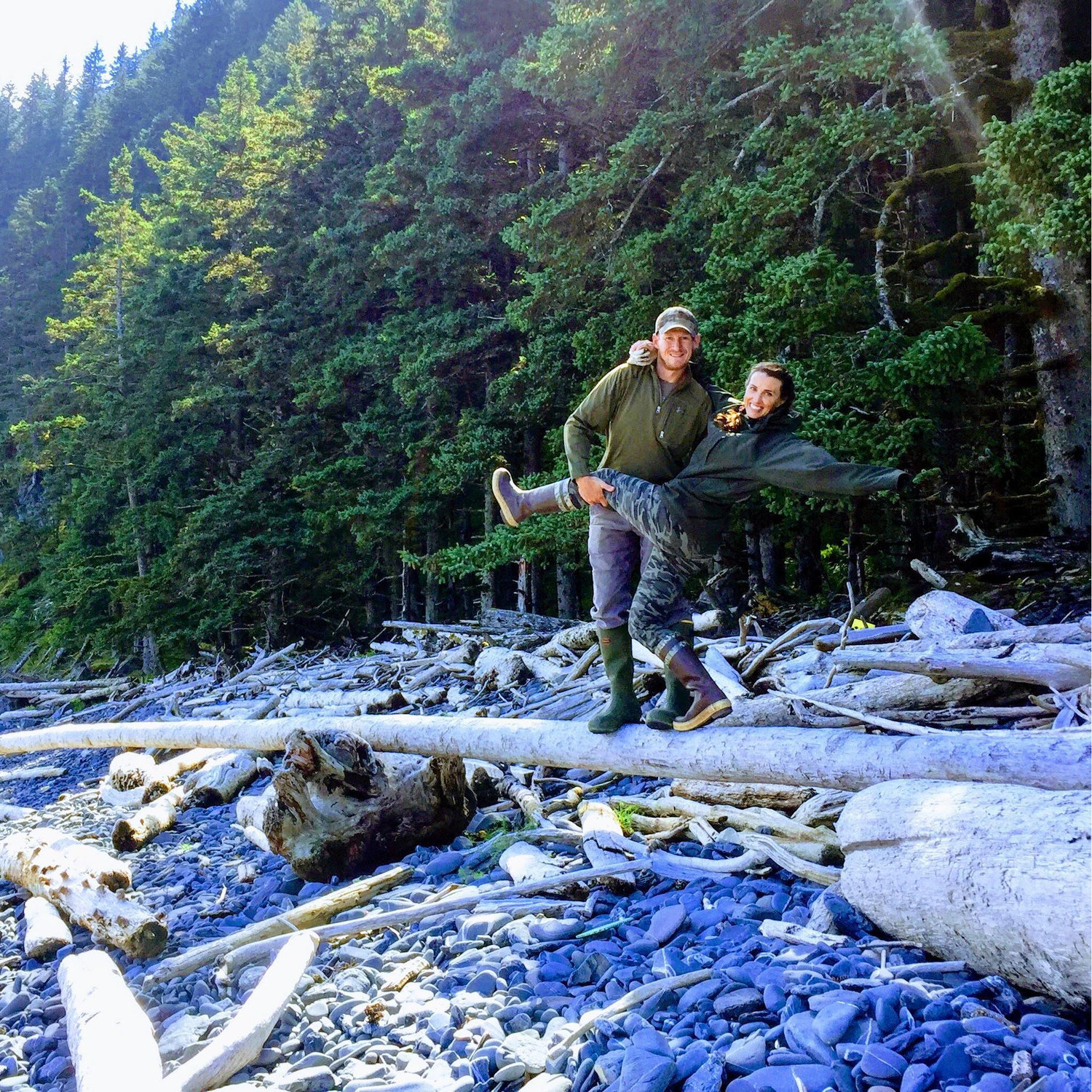 Daniel practicing his photography skills while collecting firewood in Afognak.