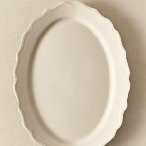 EARTHENWARE SERVING DISH WITH RAISED-DESIGN EDGE