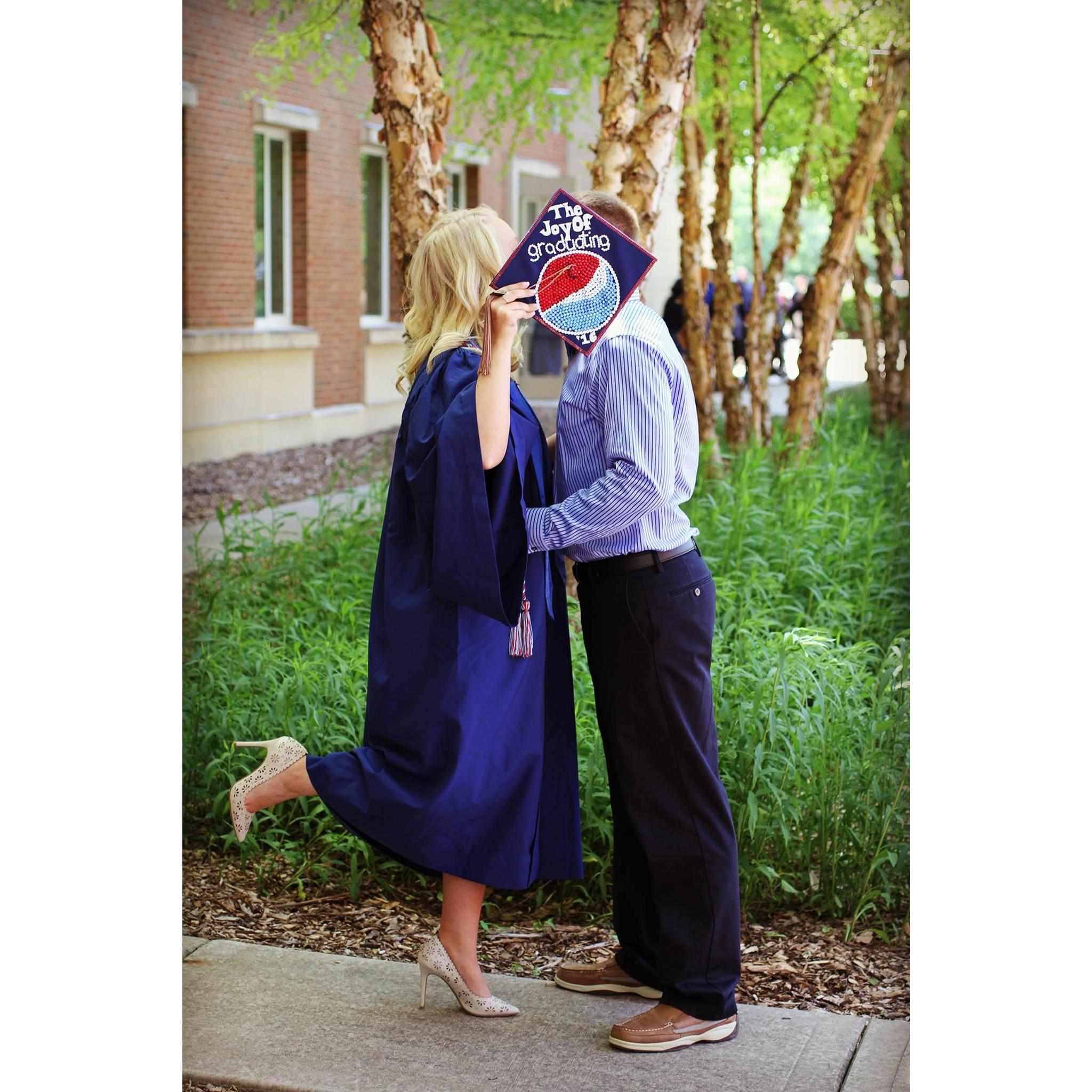 Graduation day! Don't worry, we're just talking behind the cap!