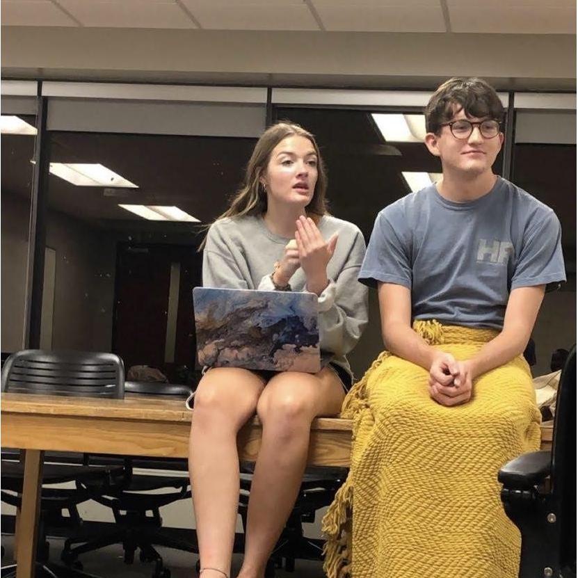 One of many nights studying with friends. Caleb swaddled in a blanket, and Hannah arguing intellectual pursuits.